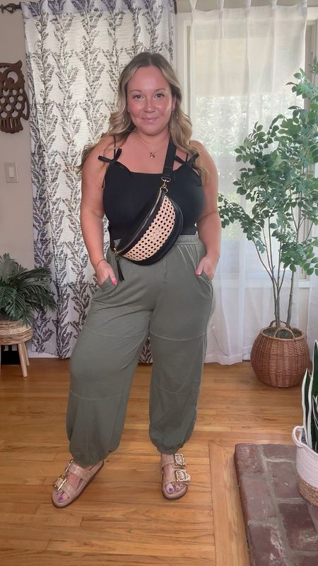 Causal everyday outfit 
Bodysuit size XL super soft and stretchy and has adjustable straps
Joggers size large- they are so soft they truly feel like pajamas
Sandals run tts 

Summer outfit, travel outfit, summer style, casual wear, mom outfitt

#LTKMidsize #LTKOver40 #LTKSaleAlert