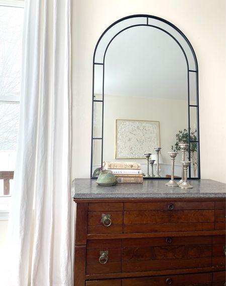 Found the perfect spot for this elegant arched mirror. I love how it reflects the light.

#LTKFind #LTKstyletip #LTKhome