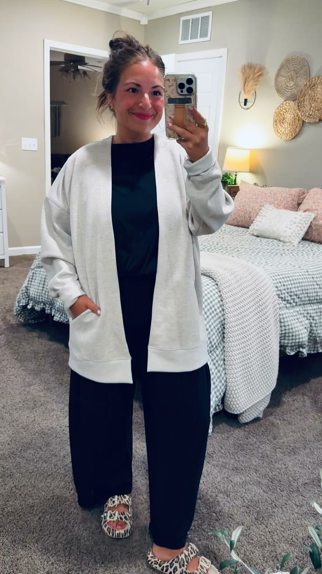 Keeping it classic in all black with a classic gray cardigan. 🤍 A simple, comfortable classroom outfit that's easy to wear all school day long!

sandals: fit true to size // wearing a 5
pants: fit true to size // wearing a large
tee: fits true to size // wearing a large
cardigan: fits oversized // wearing a medium 

 #LTKootd #LTKMidsize #LTKWorkwear