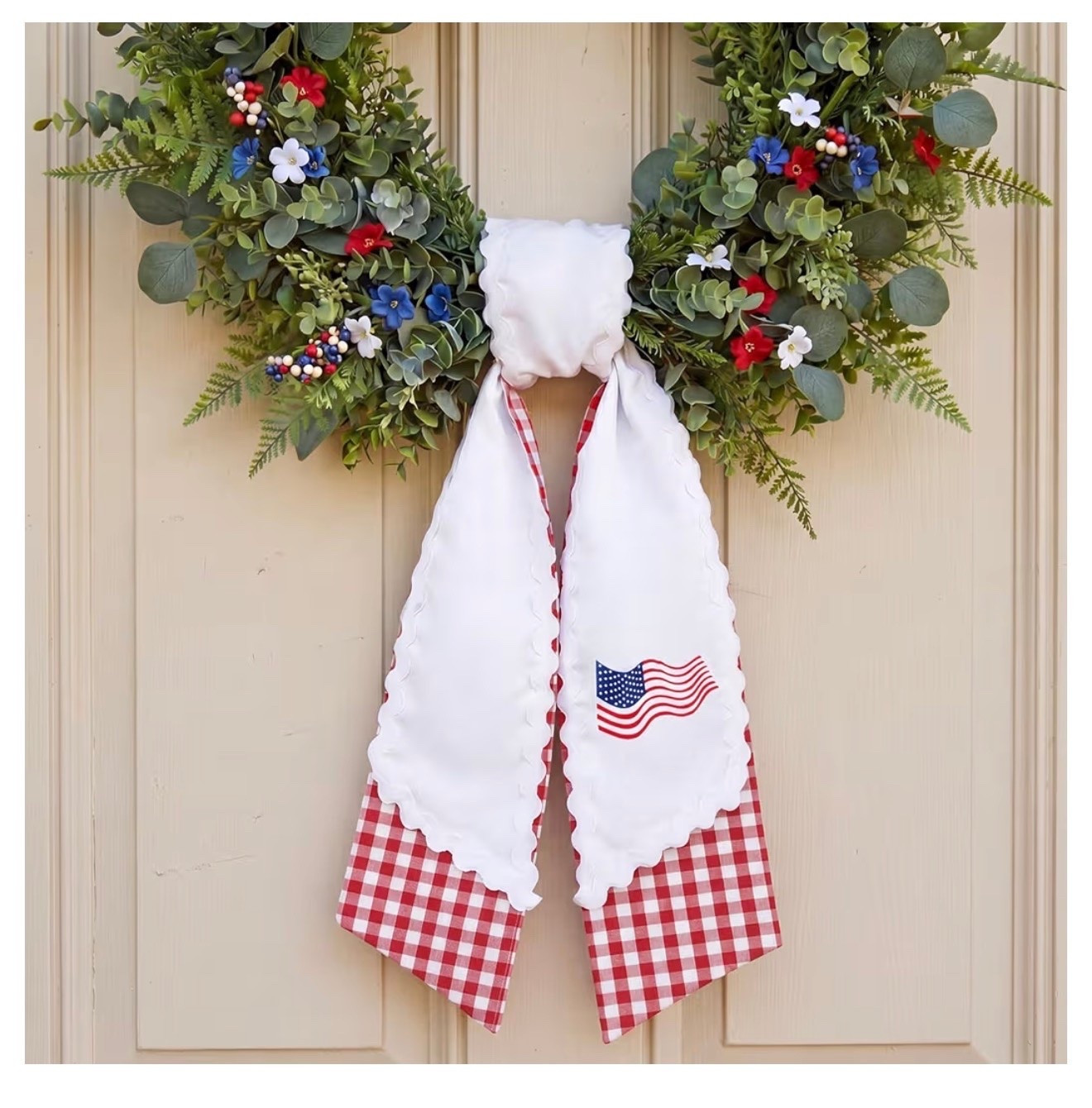 Patriotic Front Door Refresh 🇺🇸🎀

Adding the sweetest patriotic touch to your front porch! This layered wreath sash features classic red gingham, scalloped detailing, and a charming American flag accent that instantly elevates any summer wreath. Perfect for Memorial Day, the Fourth of July, Labor Day, or simply celebrating Americana style all season long. ❤️🤍💙

Easy to attach and such a simple way to make your entryway feel festive and welcoming. Pair it with a greenery wreath for that timeless cottage-meets-classic Southern look! ✨🏡

Patriotic front porch decor, Fourth of July wreath sash, red gingham wreath bow, Americana home decor, summer porch decorating ideas, front door wreath accessories, festive holiday porch decor, classic Southern home style, cottage porch inspiration, red white and blue decorations. 🇺🇸🌿💕

#LTKSeasonal #LTKHome #LTKmomlife