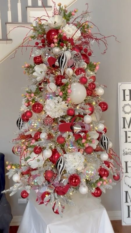 Nothing but LOVE for this Valentine’s tree in white, pink , and red.  In this tree I used my white, red, and clear Christmas ornaments in my flocked tree.  Then I popped in some special Valentine bows, heart ornaments, and pink tea roses.  This tree is stunning!

#LTKSeasonal #LTKstyletip #LTKhome