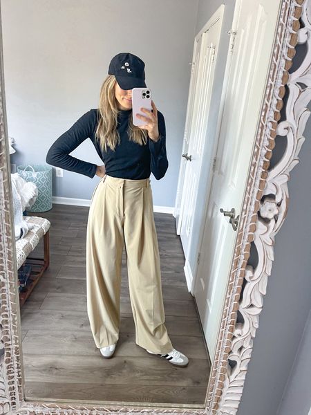 wore this to travel and felt great. Sometimes I like to switch it up from the sweatpants for traveling and high waisted pants are a great, comfy option. #highwaistedpants #traveloutfit #baseballcap #sambas #travelfit 

#LTKstyletip #LTKfindsunder50 #LTKtravel