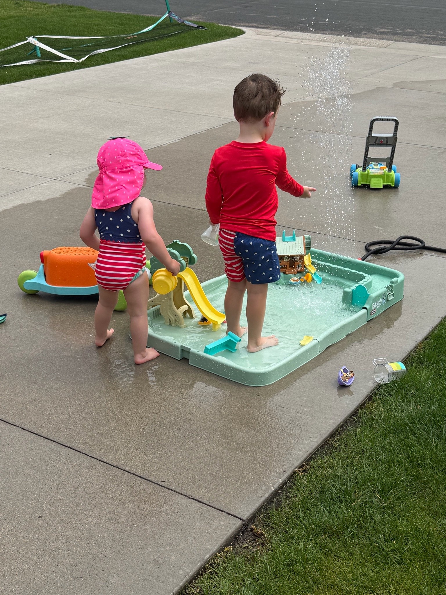 Gearing up for a hot fourth weekend!!! This water table is worth every penny