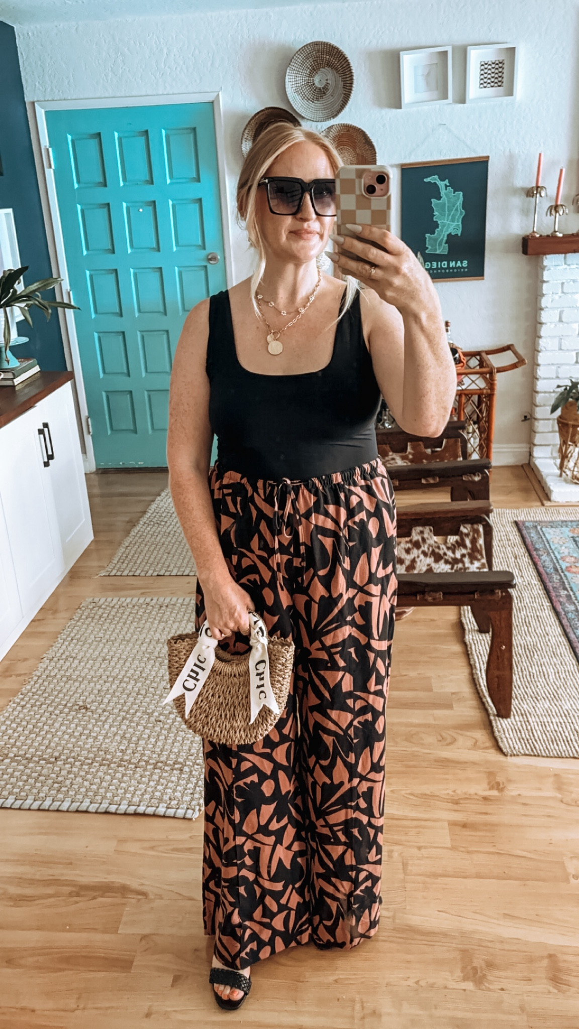 Statement pant look for date night outfit 👖✨ Pants run large, I sized down to M. Top runs small, wearing XL. 

Statement pants, patterned pants, target outfit, date night outfit, vacation outfit, summer outfit, summer look, layering tank, pumiey, straw tote, summer purse, braided heels, dressy summer look, dressy outfit, 

#LTKOver40 #LTKSeasonal #LTKFindsUnder50