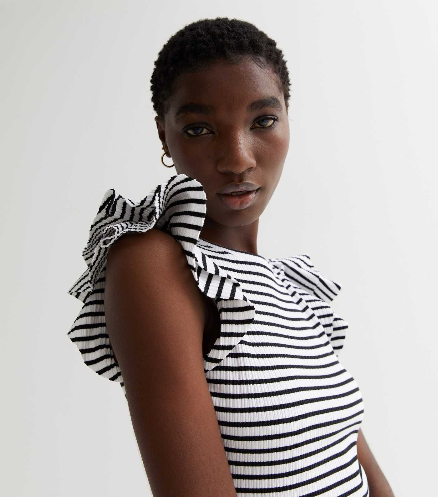 White Stripe Ribbed Jersey Frill Sleeve Top
						
						Add to Saved Items
						Remove from Sav... | New Look (UK)