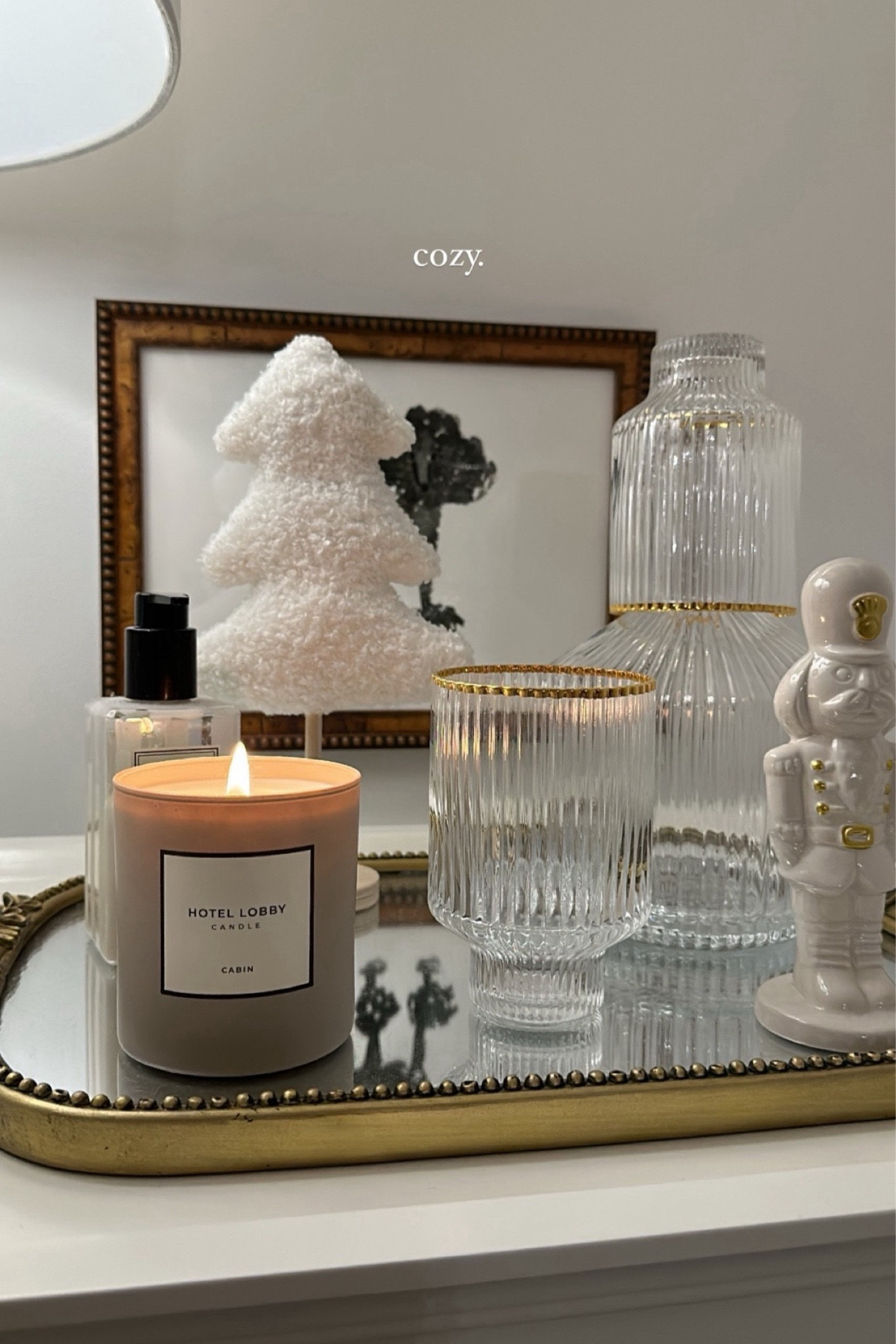 bedside table: hotel lobby cabin candle amazon glass water carafe anthropologie poodle wall art anthropologie primrose tray

#LTKfindsunder100 #LTKhome

#LTKSeasonal