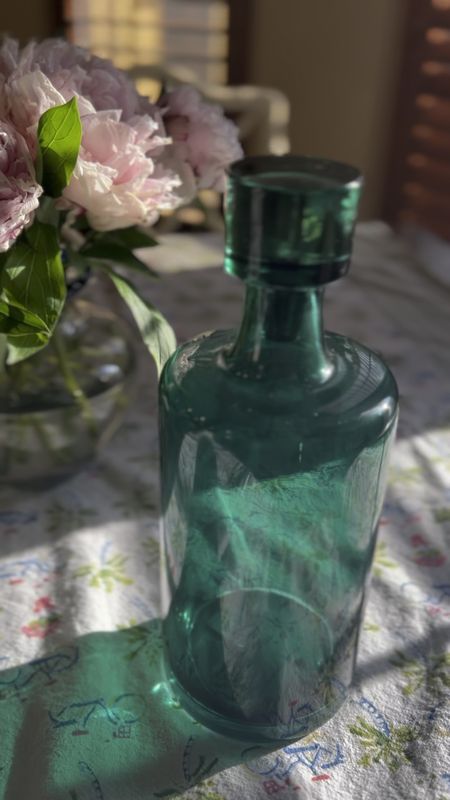 New decanter from Anthropologie. 

Just add to bar cart. 
The most heavenly shade of green. It says dark turquoise online but it's a perfect emerald IRL. 

#anthroliving #barcart #summerentertaining #popofcolor #green #bar #honedecorfinds

#LTKSeasonal #LTKFindsUnder50 #LTKHome