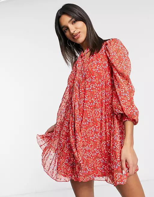 ASOS DESIGN pleated trapeze textured mini dress with neck tie in red fun floral print | ASOS (Global)