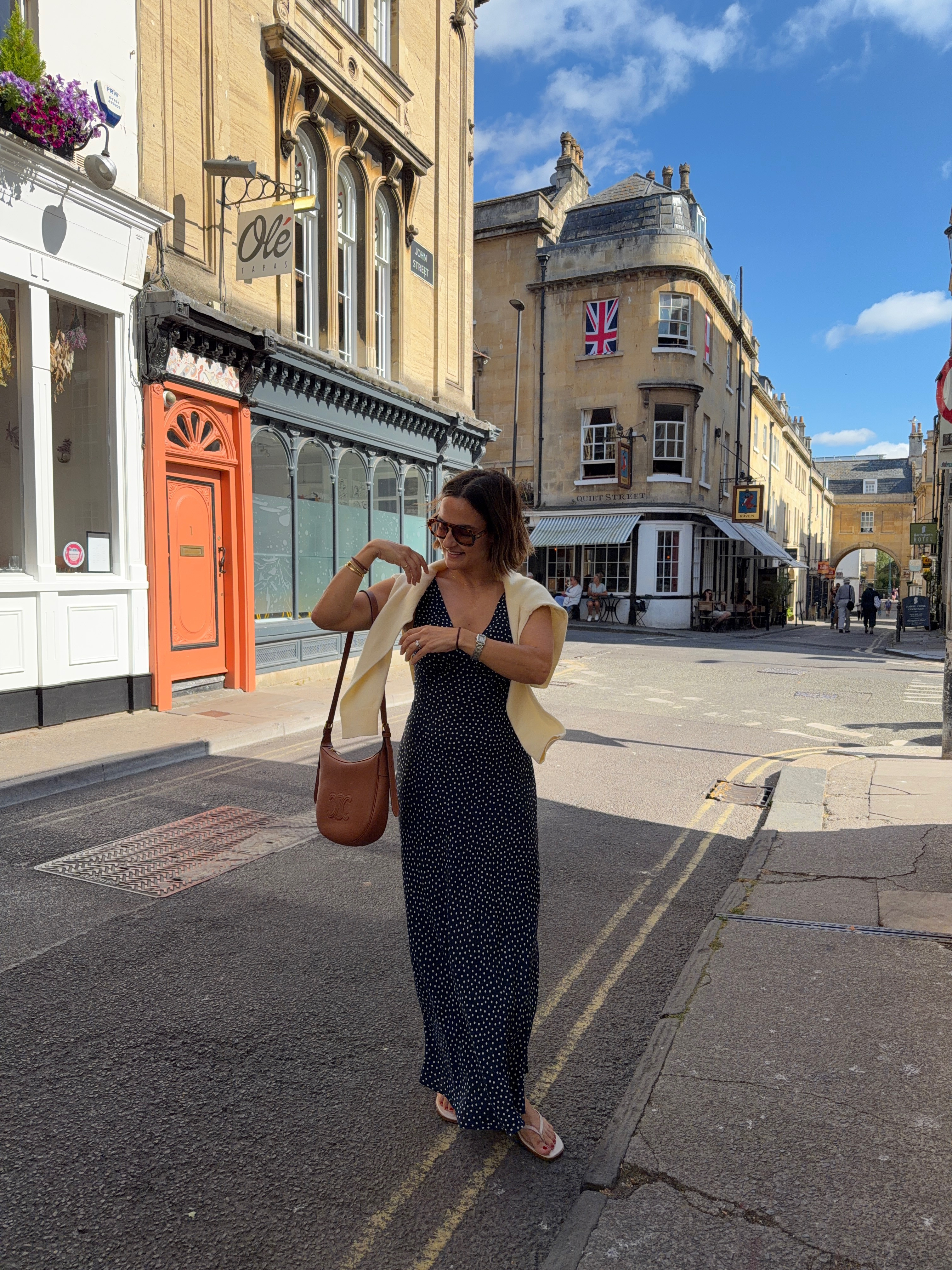 This polka dot dress is such an easy piece for summer in Europe! I love how a simple sweater over the shoulders makes it feel even more timeless. Paired it with a classic pair of wrap sandals and a brown shoulder bag for exploring during the day, but can easily be dressed up for dinner!

#LTKootd #LTKSeasonal