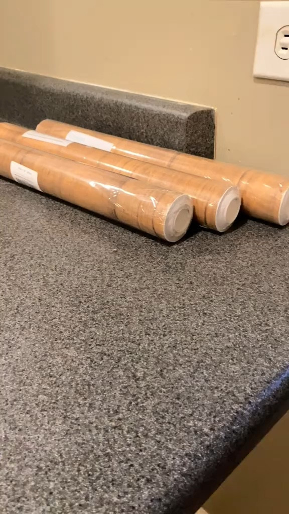 Kitchen renovation on a budget with Amazon peel n stick contact paper that is wooden pattern. I used 3 rolls in the largest size along with a box cutter

#LTKVideo 

#LTKHome #LTKFindsUnder50