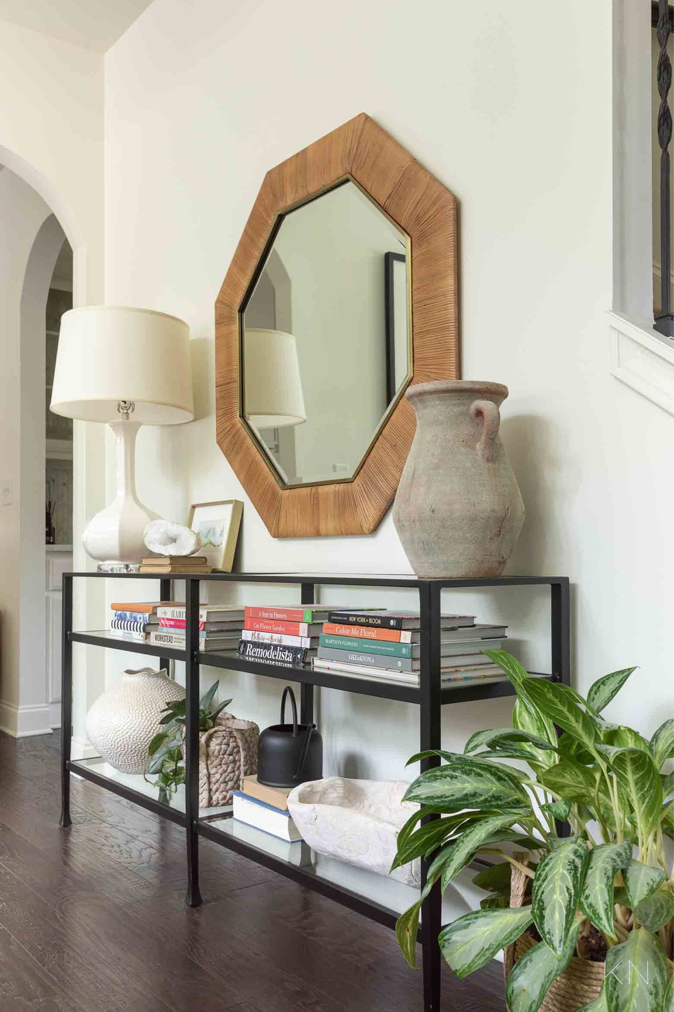 I love using coffee table books to add a pop of color to my otherwise, neutrally styled console table. Home decor living room decor console table styling rattan mirror neutral decor#LTKStyleTip 

#LTKFindsUnder50 #LTKHome
