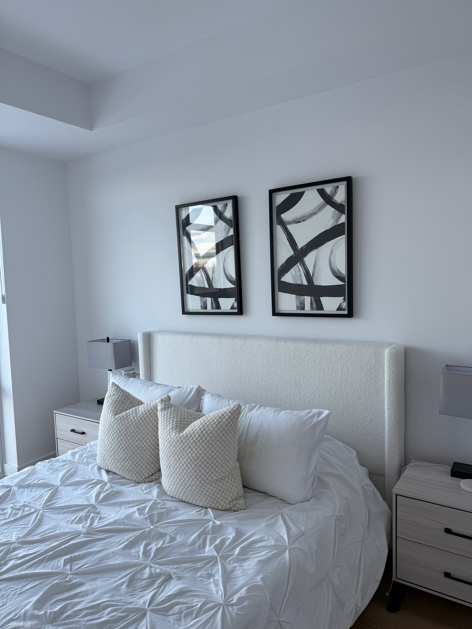neutral modern bedroom ☁️ I absolutely love how the bedroom came together with the white neutral bedding from Amazon, off white bed frame from Wayfair with our accent lamps from Amazon. Neutral home, organic modern bedroom, modern aesthetic, Wayfair bed frame, Amazon lamps, Amazon bedding, neutral bedroom aesthetic, modern home decor

#LTKSeasonal #LTKHome #LTKStyleTip