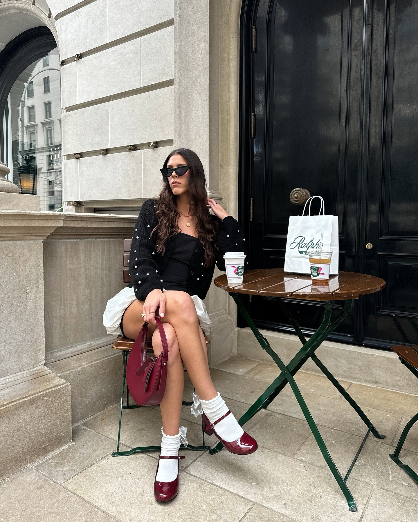 coffee dates @ralphscoffee 🖤☕️💄 outfit gifted from @tillys #withtillys 
•
•
effortless chic, pinterest aesthetic, style ideas, fashion blogger, girly vibes, trendy fashion, city girl, city chic, city outfit, aesthetic outfits, chic style, nyc style, nyc model, nj model, fall style, fall fashion, fall transitional style, sweater weather, chic fall style, fall outfit ideas, autumn fashion, mary jane shoes, pop of red, bubble hem, coffee date, coffee shop