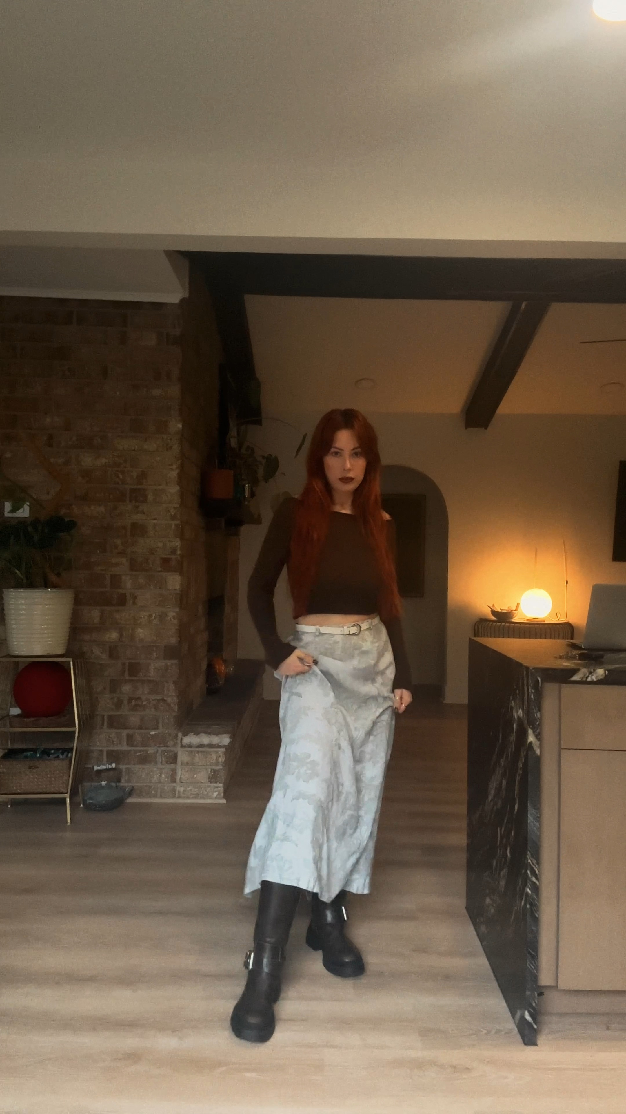 The boots are Zara from last year and the skirt is thrifted. Wearing a size XS in this sweater top  