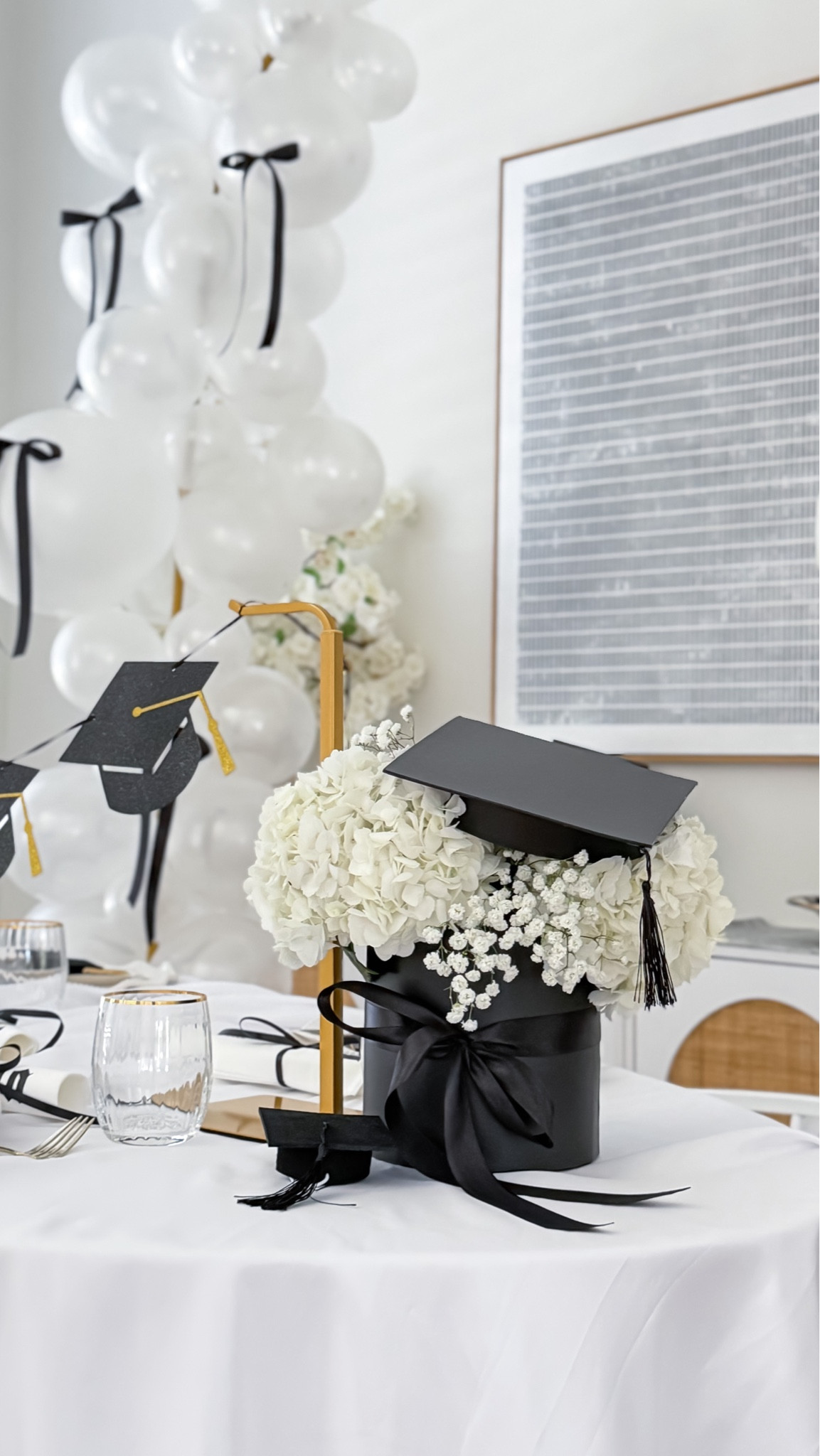 Throwing a graduation party? 🎓. I found these cute grad hat gift boxes on Amazon and used them for floral arrangements.

