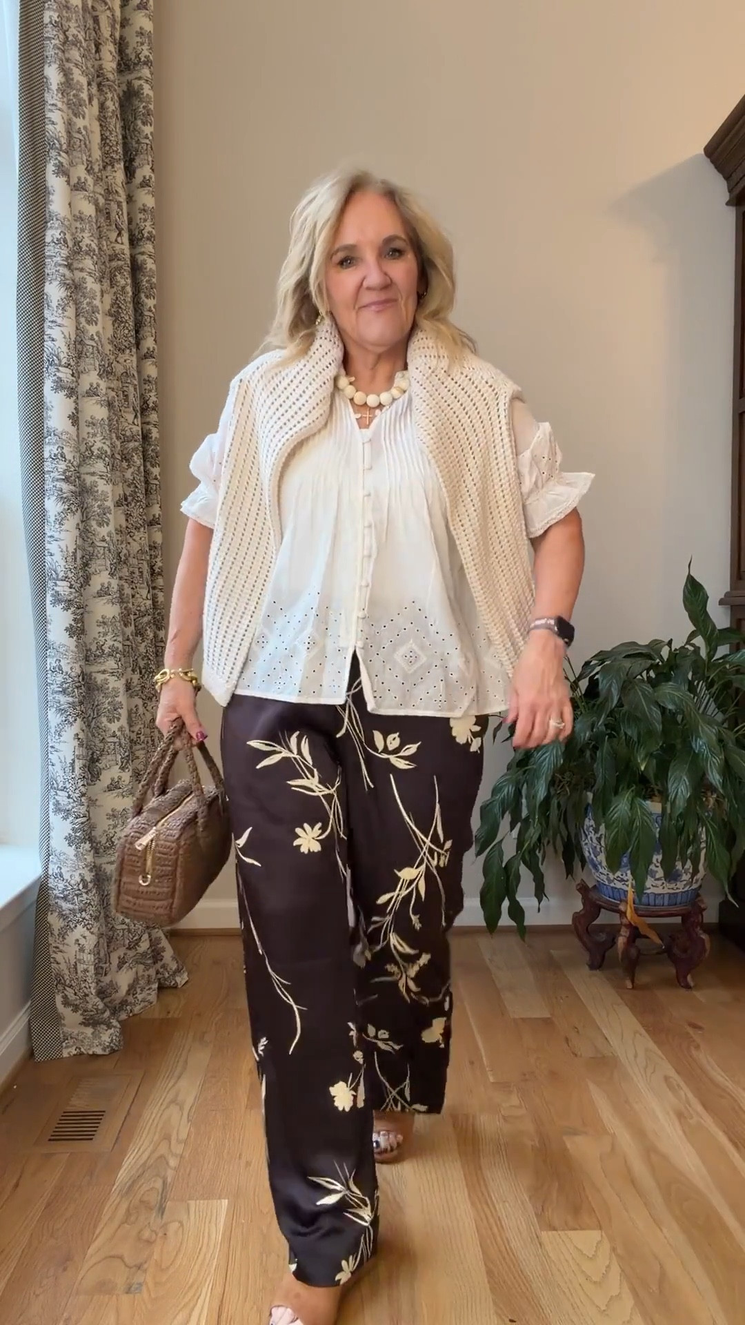 Target and Walmart combined made up most of these outfits 
Satin pants are gorgeous! I need a heel with them. Wearing size medium.
Pair with the ribbed mop, neck, and the denim lady jacket and it’s aware now look for out to dinner
Or pair with a Lacey lightweight white blouse with an acro crochet sweater over your shoulders and sandals and you’re ready for vacation or summertime.
The white cotton blouse is pretty sheer. You’ll need either a nude bra or a modesty Cami I will link one.
My necklace is by bubble bar. I love these necklaces and this ivory color is so pretty.
Don’t miss the purses by Walmart and target they make such a statement and a really great quality

#LTKTravel #LTKOver40 #LTKPetite