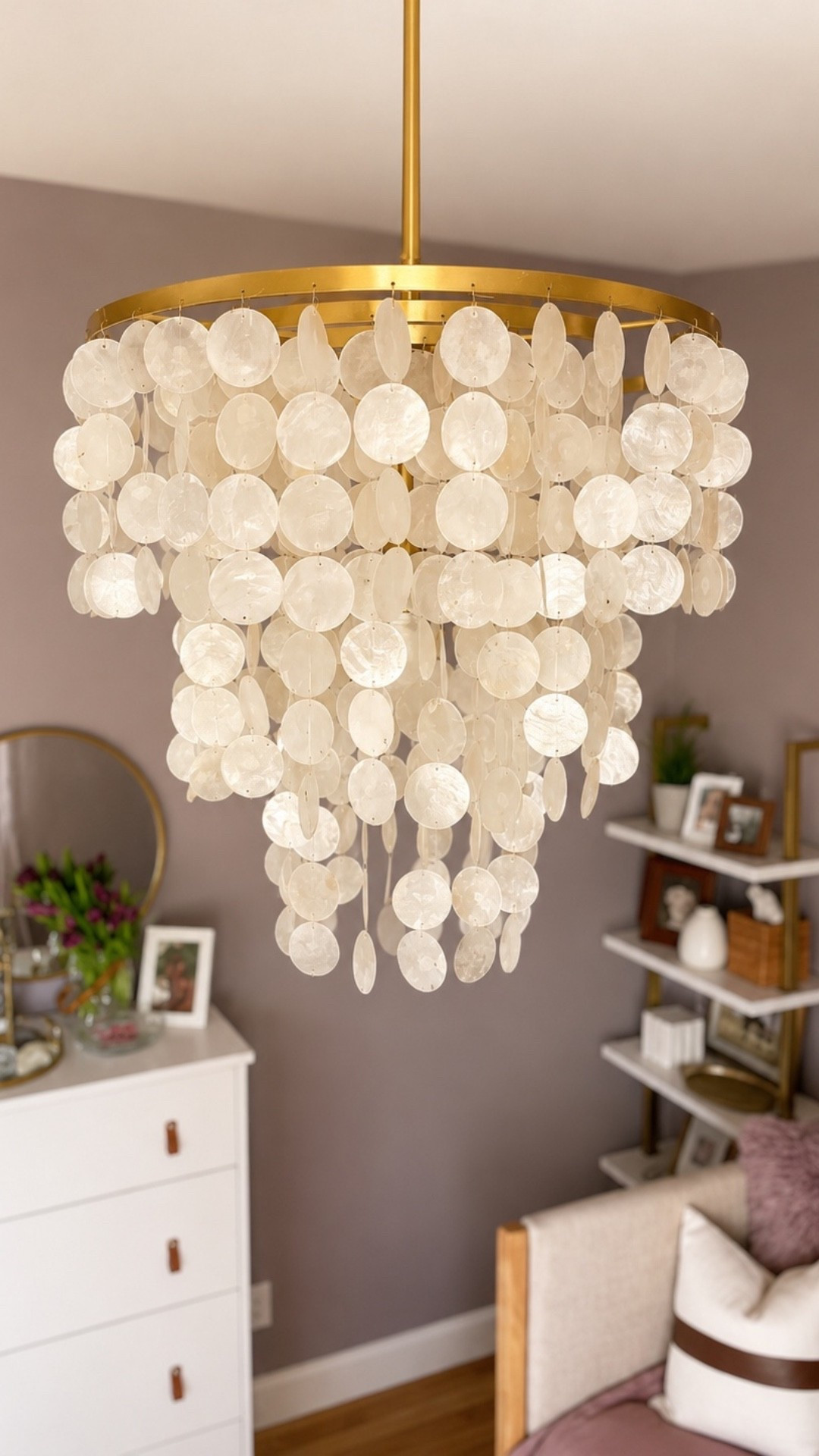 This Capiz Shell pendant chandelier is so beautiful! The perfect statement light fixture. Works great in a bedroom, home office, or bathroom over tub.

#LTKHome #LTKmomlife #LTKSaleAlert