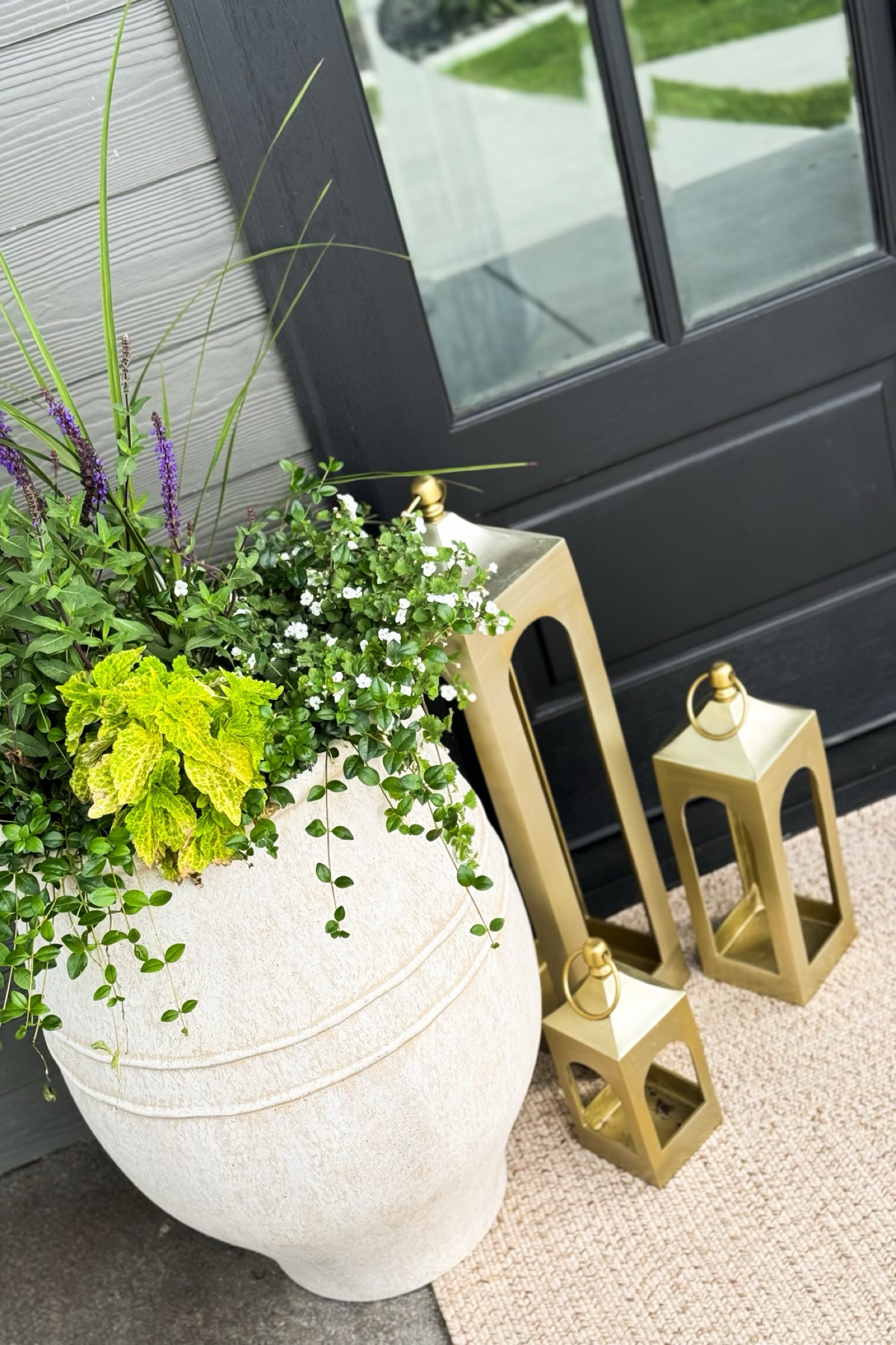 Finally working on our spring front porch.. I'm a little behind but it's better late than never!

Home  Home decor  Spring front porch  Spring home  Outdoor decor  Outdoor styling  Lanterns  Lighting  Outdoor planter  Neutral home  Area rug

#LTKSeasonal #LTKHome