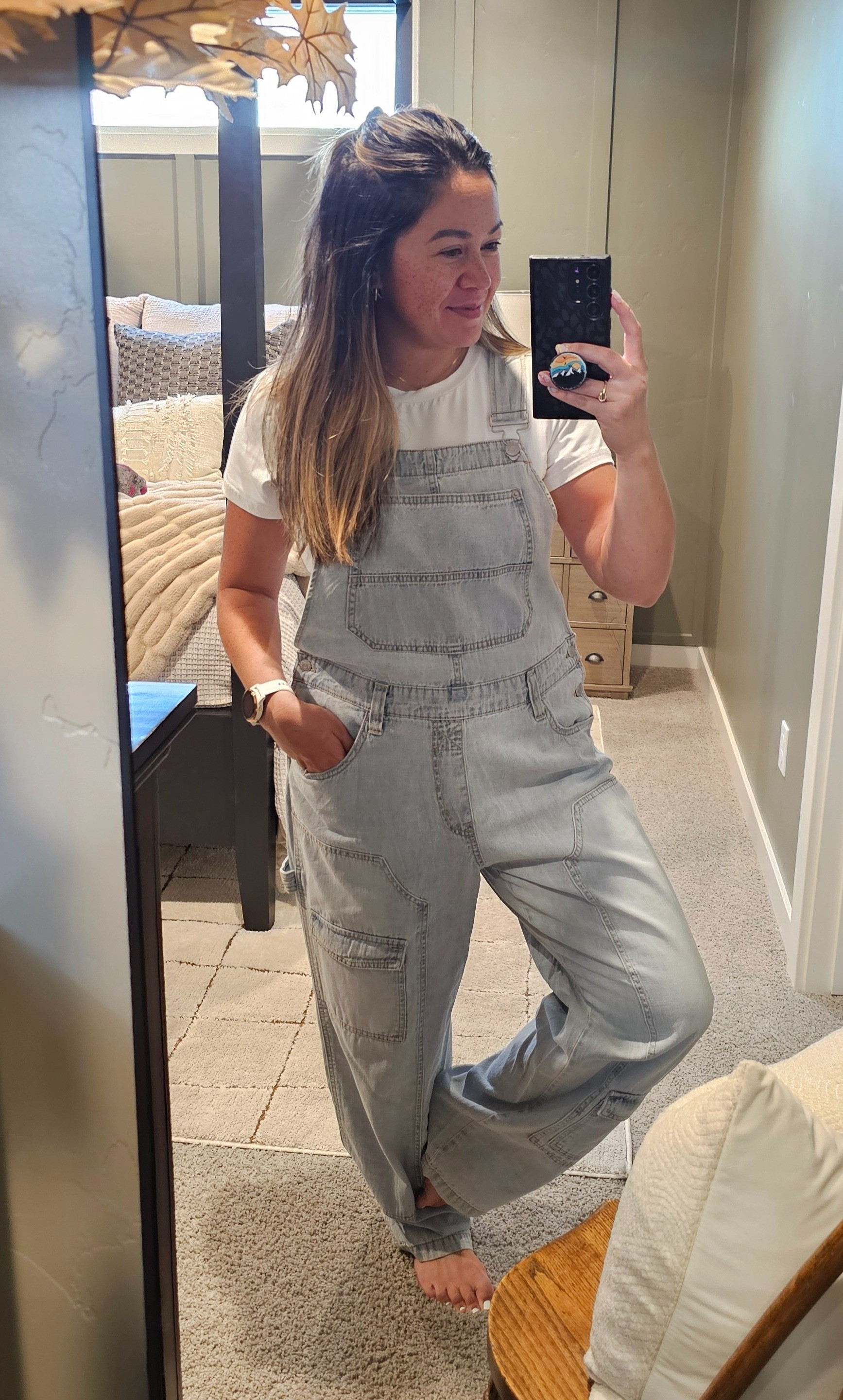 Buy the overalls! They're so cute and so comfy. Perfect addition to the fall capsule wardrobe. This white tee is buttery soft and is the perfect staple. I sized up to a Large in the shirt for more comfort, although it is still fitted. I'm wearing a Medium in the overalls. Perfect oversized fit.

#LTKStyleTip #LTKBeauty #LTKFallSale