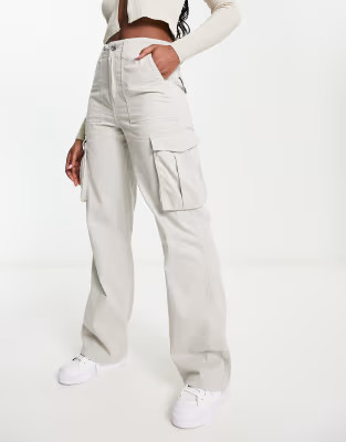 Bershka straight leg cargo trousers in stone | ASOS (Global)