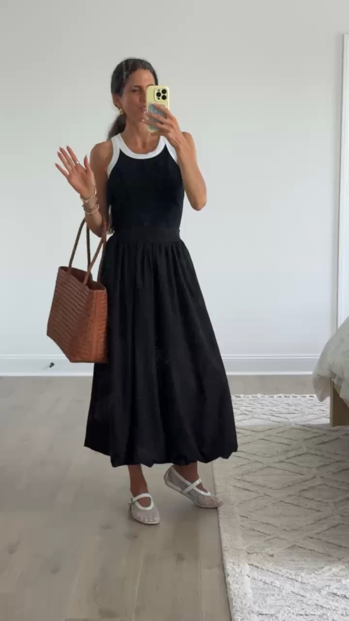 A black midi skirt is the fashion equivalent of a blank canvas. Casual with sneakers, polished with sandals, elevated with heels, and cozy with a knit. This piece truly does it all.

#LTKSeasonal #LTKmomlife #LTKgrwm