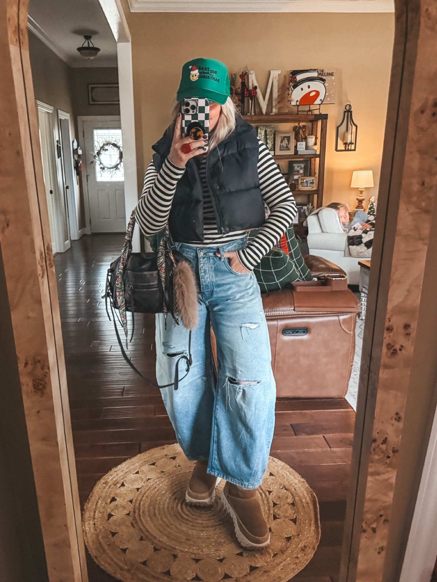 My outfit of the day 🖤 These are some of my most fav barrel jeans and I  love the fit of this turtleneck. I linked my vest too and also some more affordable options. 
Jeans - sized down one 
Turtleneck- size m
Vest - m
Uggs - true to size 

#LTKgrwm #LTKSaleAlert #LTKootd