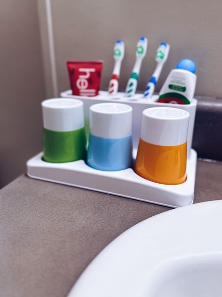 This toothbrush holder is a must for my 3 boys 