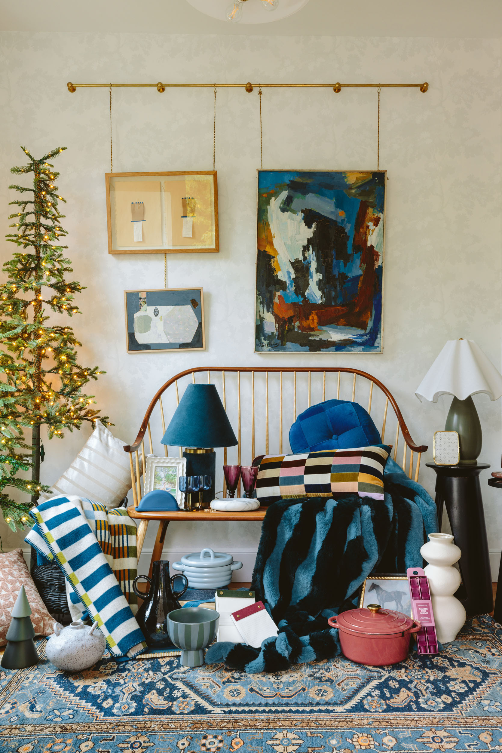 Welcome to my 2024 home gift guide – where I did things very differently this year. After years of combing websites to find the good stuff and then making graphics to show you, I decided to treat myself to days and days of IRL product testing and vetting at my favorite retailers (small business and makers gift guide is still in the works, FYI) and collected a ton of really good stuff – ranging from $3 to $200 (most under $100). 

All of these are STAND OUT pieces in my mind – some simpler (like a really good-looking but affordable notepad) and some pretty epic (like the velvet lamp that is under $100). The most perfect color for a Dutch oven for $40 (which Emily M. bought from me because it’s so pretty) and that excellent bright blue round pillow from Schoolhouse (and Clare V. collection).