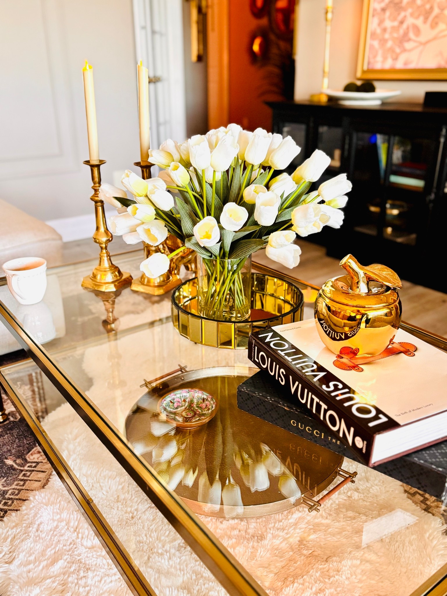 Summer faux florals white tulips coffee table ideas coffee table decor gold decor 

#LTKSummerEdit #LTKFamily #LTKStyleTip