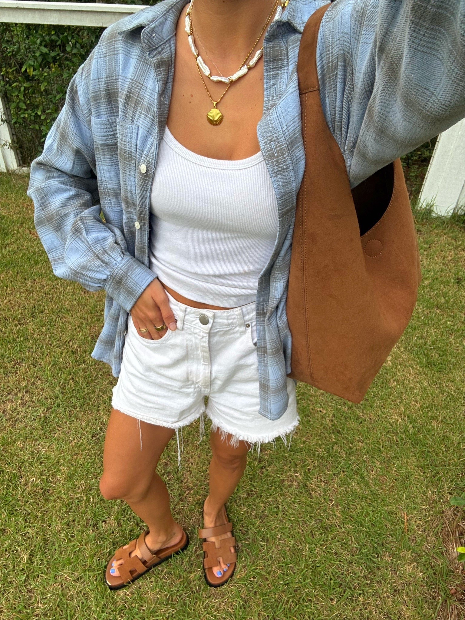 early fall outfit inspo🫐 love this blue light weight flannel with my white denim shorts! My favorite brafree tank!! these suede sandals + suede brown tote bag match perfectly and scream fall🤎

#LTKootd #LTKSeasonal #LTKdayinmylife