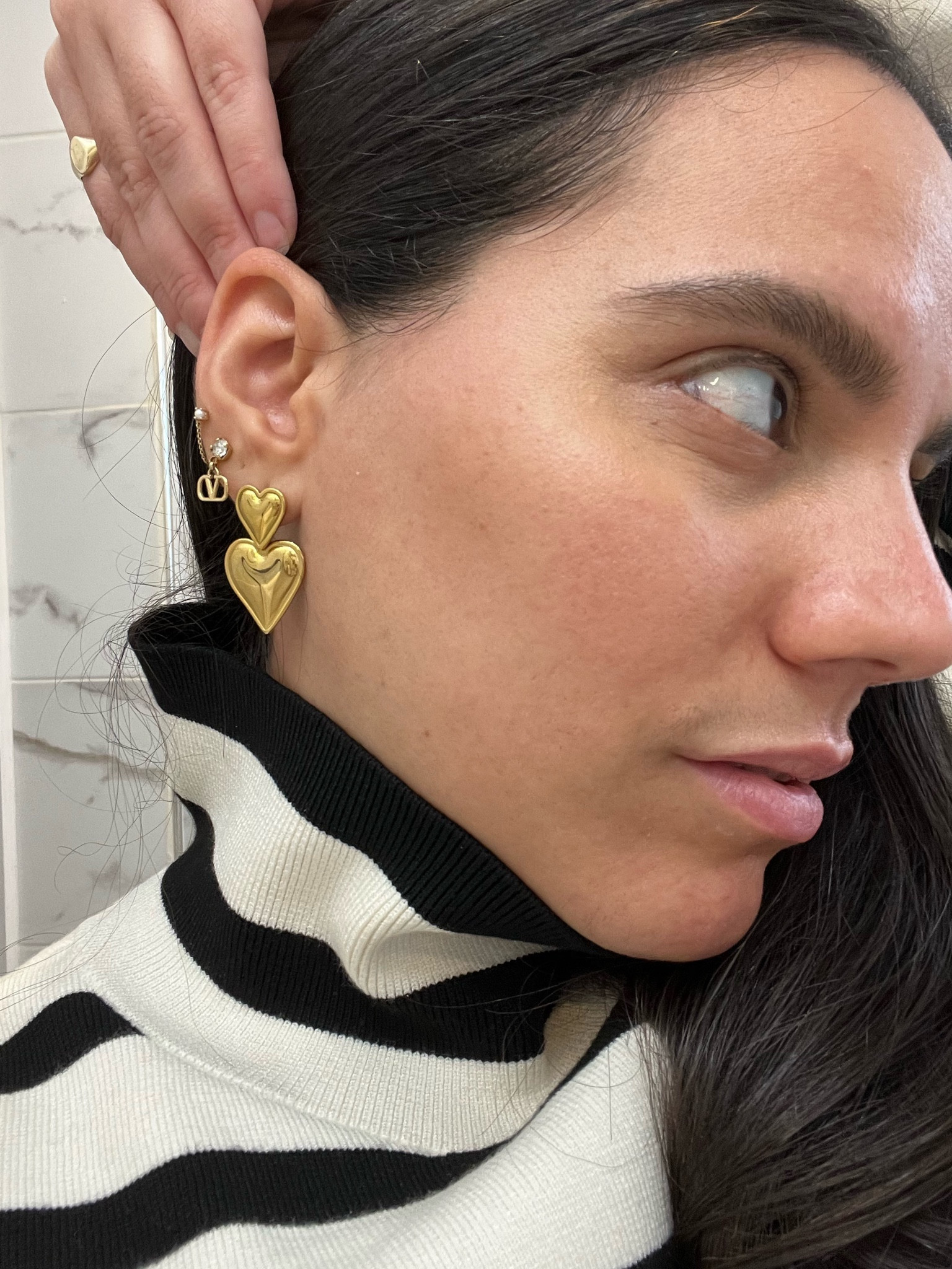 Jewelry, but make it Valentine’s. 
Valentino Earrings:
VLOGO SIGNATURE EARRINGS IN METAL AND SWAROVSKI® CRYSTALS in Valentino’s site: 
Product code: 4W2J0H29YCW_MH5

#LTKstyletip #LTKsalealert #LTKfindsunder50