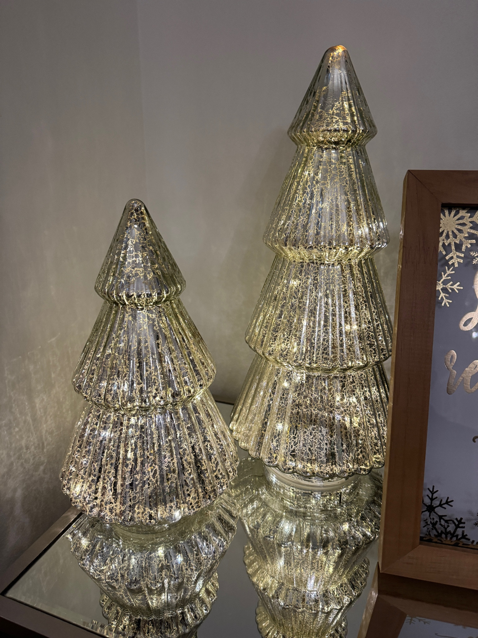 🎄 Holiday Decor 🎄
Adding Christmas trees to your Christmas decor is a great way to extend your decorations past Christmas. You can take down the Santa / Christmas items and leave a “winter” theme up a little longer. This allows you to enjoy your decor a little longer. 

These mercury glass battery operated lit trees add a touch of magic to the ambiance with a soft glow. Mix and match in ceramic trees, too. 🌲 

#everypiecefits

#LTKSeasonal #LTKhome #LTKHoliday