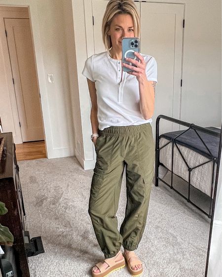 This is my kind of outfit! Cute, comfy and casual. This henley is one of those tops you can wear with anything. Several colors available. I’m wearing small. Pants are XS, have cargo pockets, drawstring waist and zippers at the ankles. 🤩 and these sandals!!! I’m wearing my usual size in these, so comfortable!

#LTKover40 #LTKsalealert #LTKshoecrush