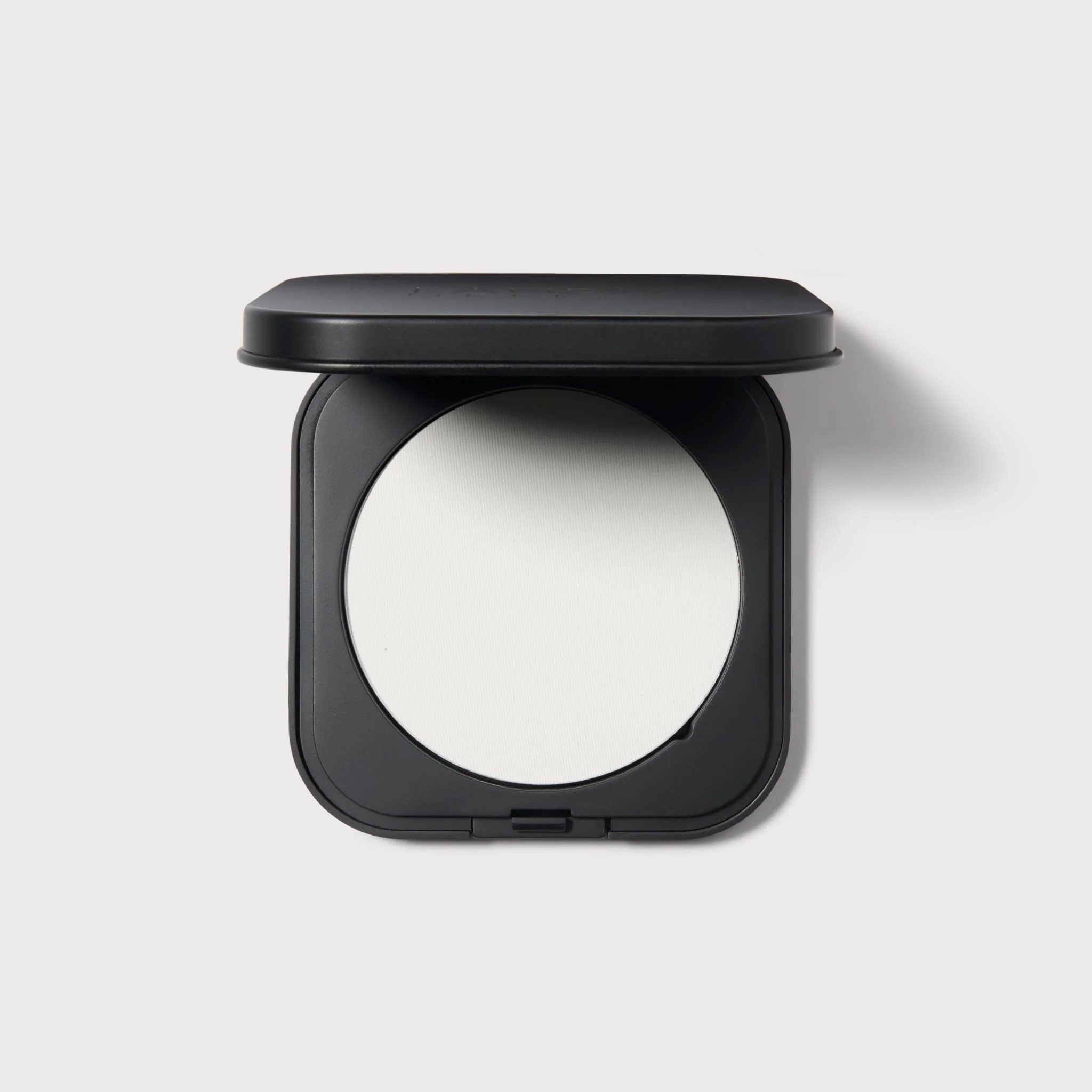 Matte Maker Translucent Universal Setting Powder for All Skin Tones | Laura Geller