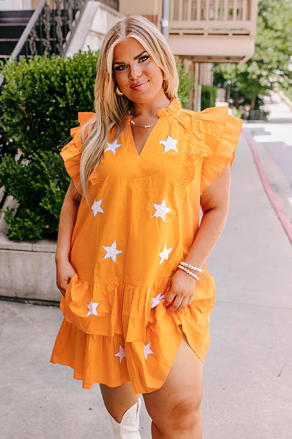 Under The Stadium Lights Ruffle Mini Dress in Orange Curves | Impressions Online Boutique
