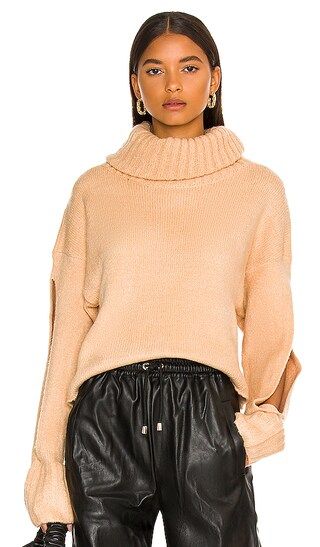 Cropped Turtleneck Sweater in Beige | Revolve Clothing (Global)