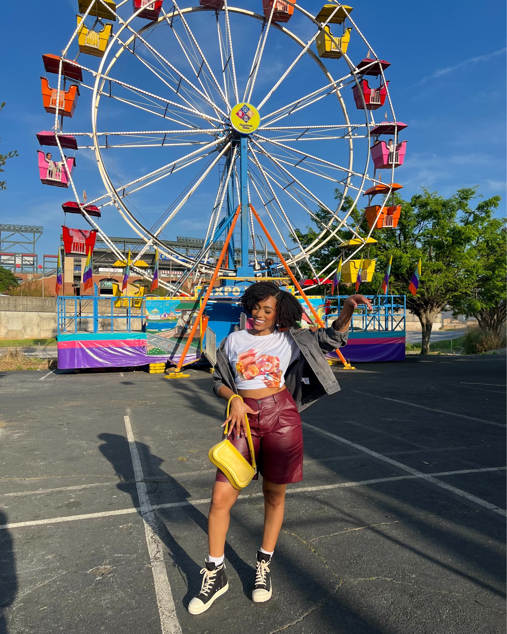Fair fit, but make it stylish AND comfortable 🎡💥

Wore these burgundy faux leather shorts from SHEIN for a fun texture moment that was still super comfy to walk around in. Styled it with a colorful graphic tee (also SHEIN) to bring some color, and threw on my washed black oversized Uniqlo denim jacket to balance it out.

And yes… the Rick Owens DRKSHDW sneakers came out to play 😌 They gave the whole look that elevated edge while still matching the casual vibe.

Finished it off with my yellow JW PEI purse for the cutest pop of color against all the fair lights 🌈✨ This look photographed SO well and I didn’t have to sacrifice comfort to be cute—10/10!

Linked what I could on LTK 💛 #fairoutfit #ricksdrkshdw #sheinfinds #jwpei #uniqloootd #ltkfashion #fallfits #comfyandcute #styledforsummer #streetstyleinspo #fauxleathershorts #colorfuloutfitideas

#LTKMidsize #LTKFindsUnder50 #LTKStyleTip