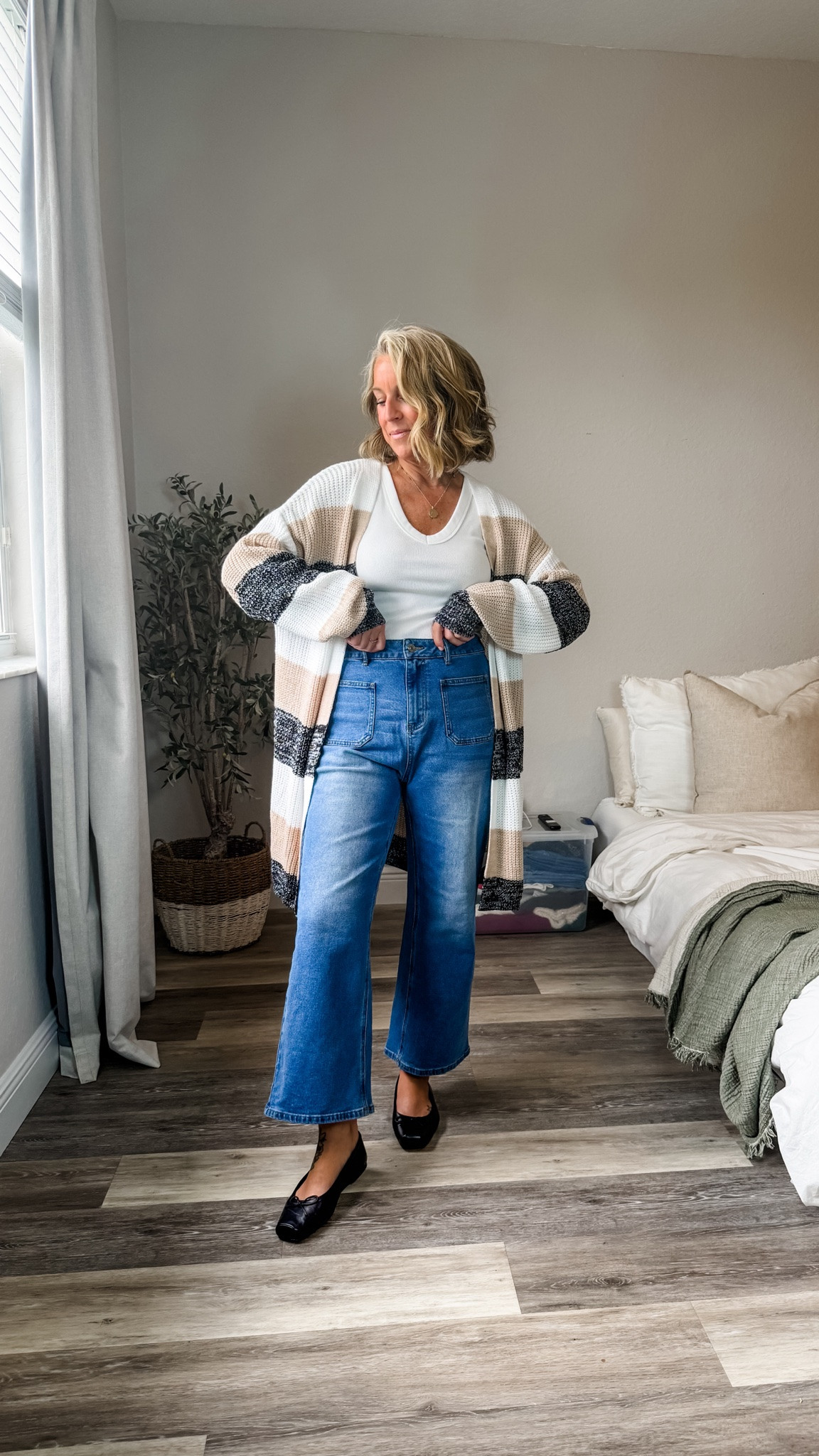 A simple layer helps keep things comfortable when the air shifts. I find that a loose fit works best for everyday movement. In a medium cardi and top and jeans but could’ve done a small in the jeans and cardi. @Cupshe

#LTKgrwm #LTKSeasonal #LTKootd