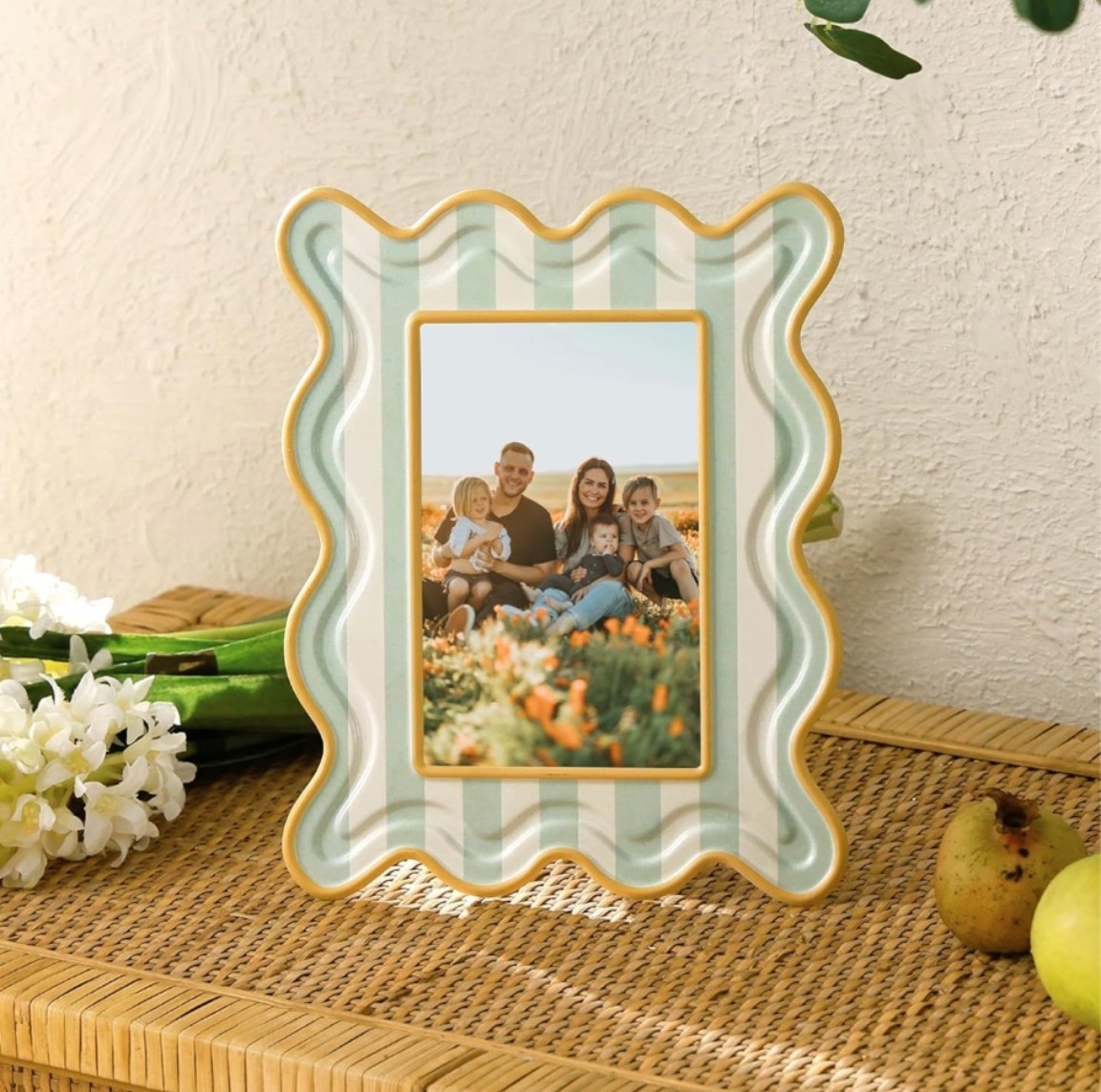 Anthro vibes without the Anthro price tag 🩵✨ This wavy striped picture frame is giving designer charm, playful color, and vintage-inspired style for a fraction of the cost. The green and cream combo is perfect for brightening up bookshelves, entry tables, desks, and gallery walls.

Amazon has become my favorite spot for finding home décor that looks straight out of a boutique—without the boutique price tag. Linking this frame plus more colorful, eclectic, Anthropologie-inspired finds that add personality to your space without breaking the bank. 🏡🌿

#LTKHome #AmazonHome #AnthroInspired #AmazonFinds #HomeDecorFinds #ColorfulHome #EclecticDecor #AffordableHomeDecor #ShelfStyling #HomeInspo #LTKStyleTip #AmazonDecor