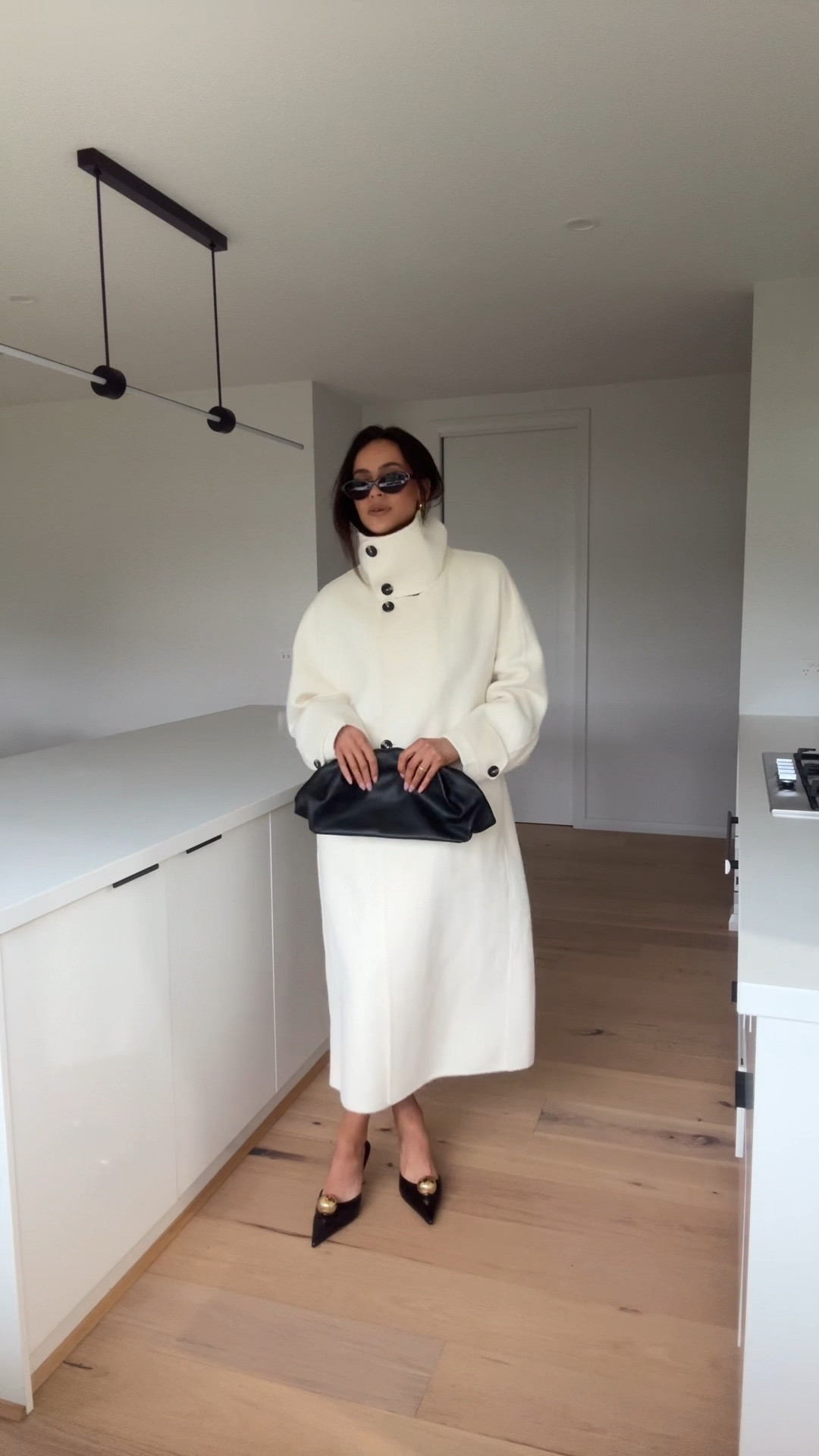 White coat. Black heel. Gold accessories  

#LTKaustralia #LTKdatenight #LTKbag