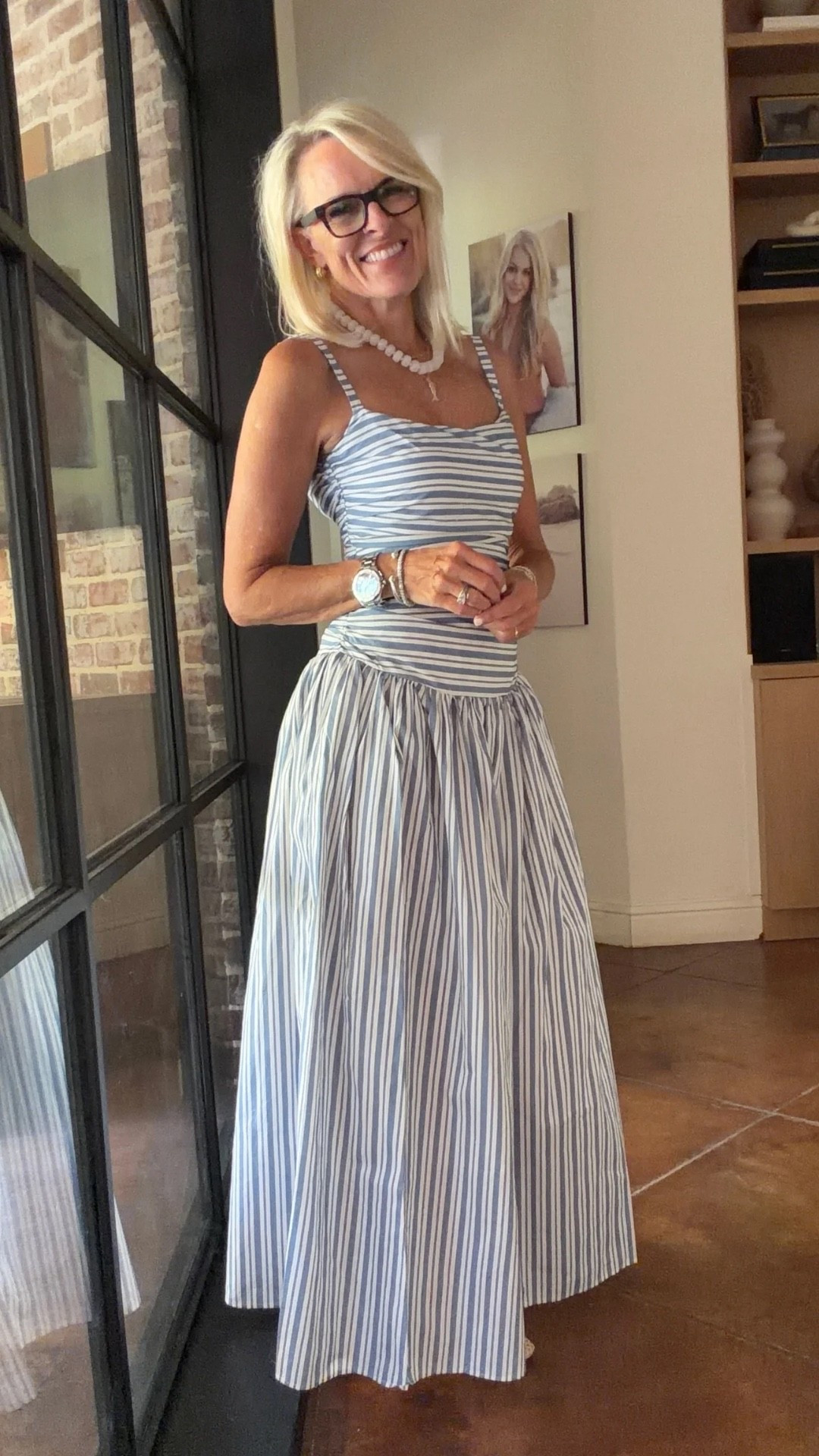 This blue-and-white striped maxi dress is such a beautiful summer find. I love the square neckline, adjustable straps, defined drop waist, and flowing A-line skirt, it feels feminine without being fussy. The 100% cotton fabric and lining make it an especially nice choice for warm-weather days, and I can see this working for everything from lunch to a summer dinner or vacation.

💡 LTK MADE EASY
❤️ Heart = Support my posts!
🔖 Save = Get sale & restock alerts
📋 Lists = Keep favorites organized
📲 Share = Send lists and products to a friend. Hello, Christmas List!
💬 Comment = Ask me anything about what I’m wearing.:-)

#LTKOver40 #LTKootd