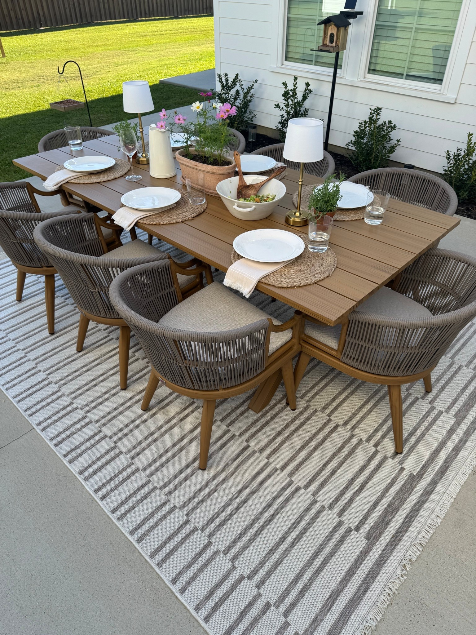 Outdoor living space on an Amazon budget… to the eye it looks high end designer. The table looks teak and color is stunning! It’s maintenance free because it’s aluminum metal. The chairs are super durable and have adjusted feet to level the chairs out as well as removable cover covers for the seats! 🙌🏻 

You can use code PL10Brittany for 10% off! 🙌🏻 I have a nine piece set… Eight chairs and one table. They have other size options available. 
