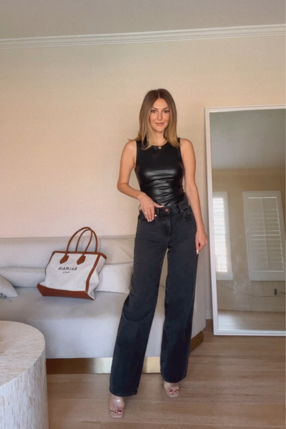 Black Faux leather bodysuit on sale (wearing XS, TTS) size one up if you get the croc effect bodysuit
Black wide leg jeans (wearing size zero (I usually size 1 down in express but, size 2 would be better so go TTS) on sale 

Fall outfits 
Balmain tote bag 
Clear heels 
Date night outfits 
Basics 
Black jeans 
Gold waterproof jewelry 

See my IG @drluxy for lots of style inspo 






#LTKsalealert #LTKSeasonal #LTKunder50