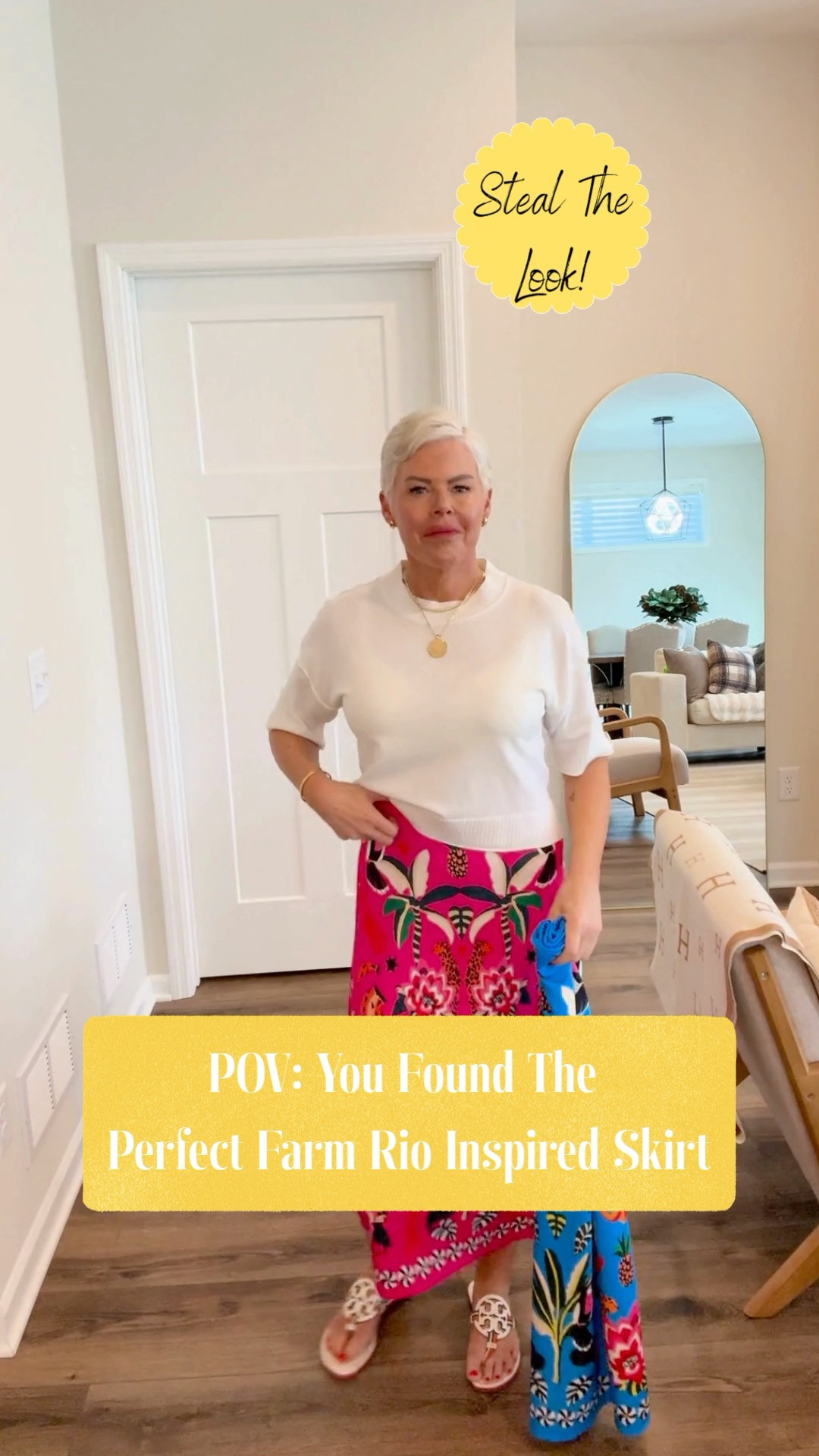 These bold and colorful Farm Rio inspired midi skirts from Amazon are perfect for resort wear, or for warm weather at home. I've added an Anthro look 4 less white lightweight sweater andTory Burch slides to complete the look. What a cute spring and summer outfit! 

 #LTKootd #LTKOver40 #LTKTravel