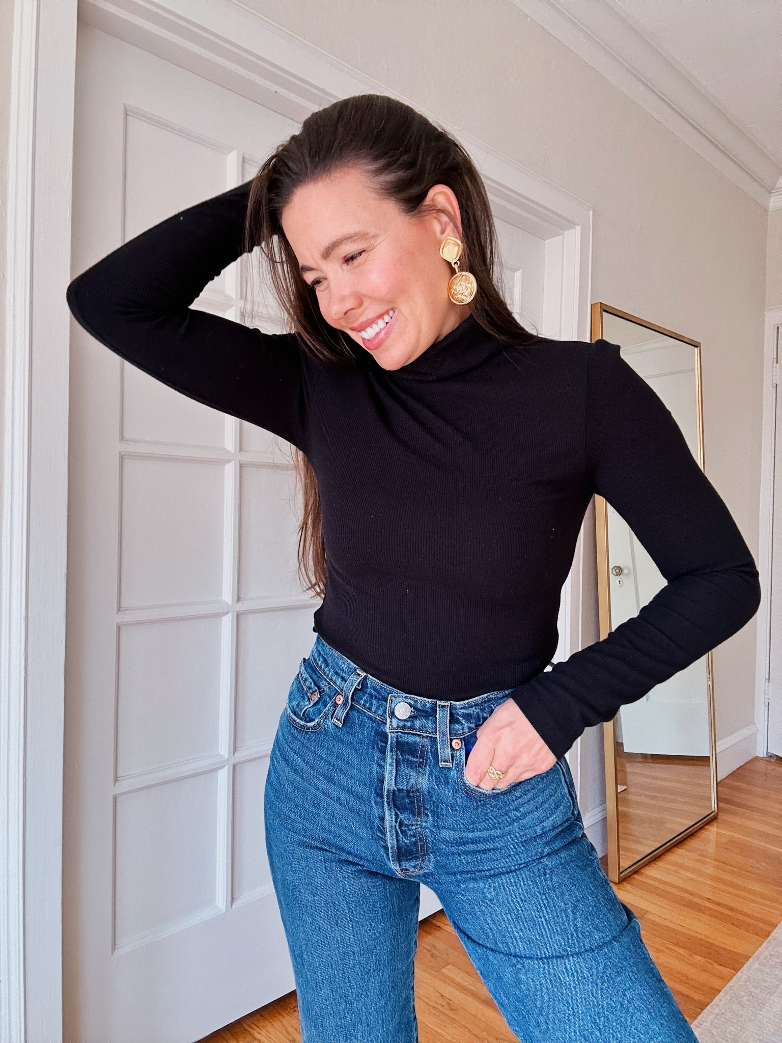 Best black ribbed turtleneck from Sanctuary. Wearing size XS. 

Black, turtleneck, sanctuary 

#LTKStyleTip #LTKHome #LTKFindsUnder100