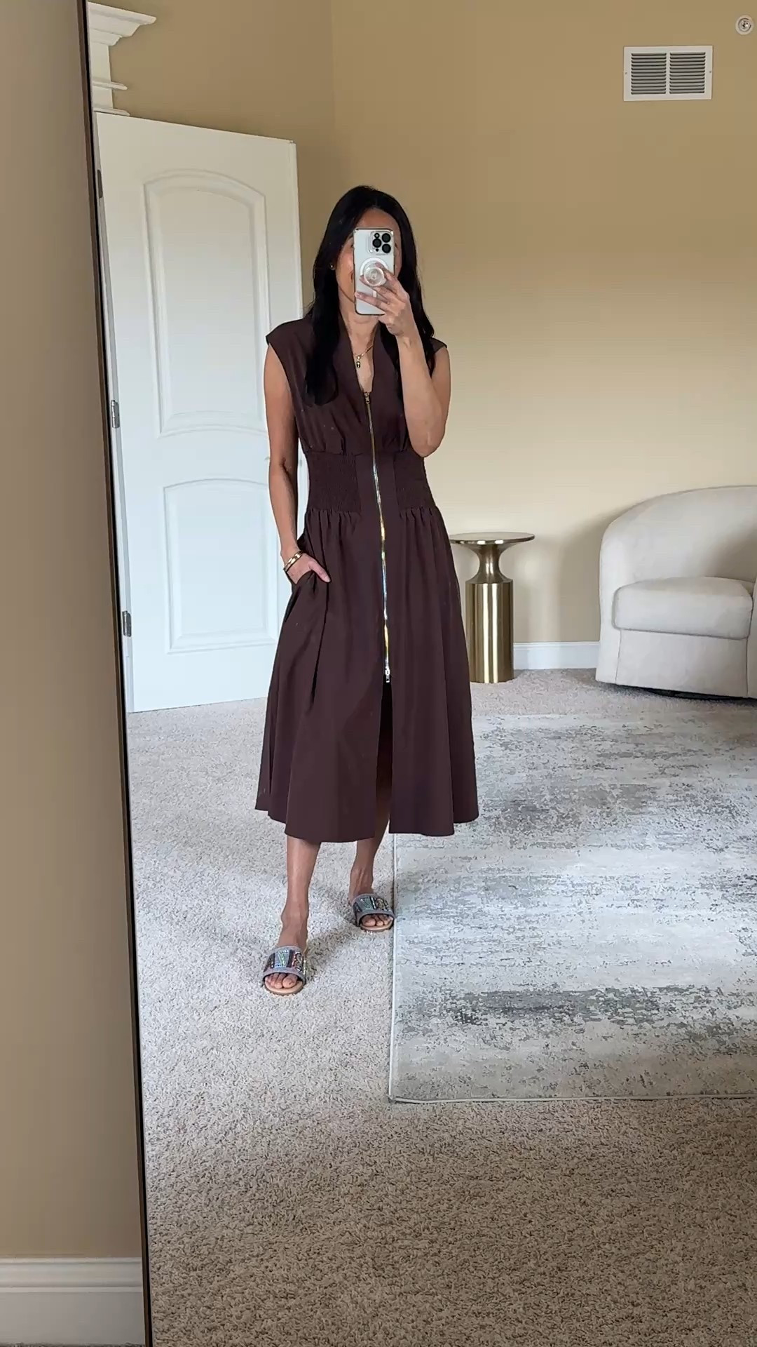 Classic Midi Dress under $50. (Actually around $31 today.) Spring dress. Spring break. Vacation    
I have loved this style of dress which they have at Anthro in cotton. I couldn’t get the proper fit in that exact dress. Saw this alternative and although it is done in an athleisure type fabric, I think it works. Still a bit too roomy for me on top, but otherwise would be true to size. It’s lined and drapes well. Fabric is similar to that of a few of my favorite Athleta jumpsuits. This chocolate color is really nice; other colors also available. 
Slide sandals on sale for around $26 with Circle discount. Also comes in neutral option. 



#LTKFindsUnder50 #LTKSaleAlert #LTKOver40