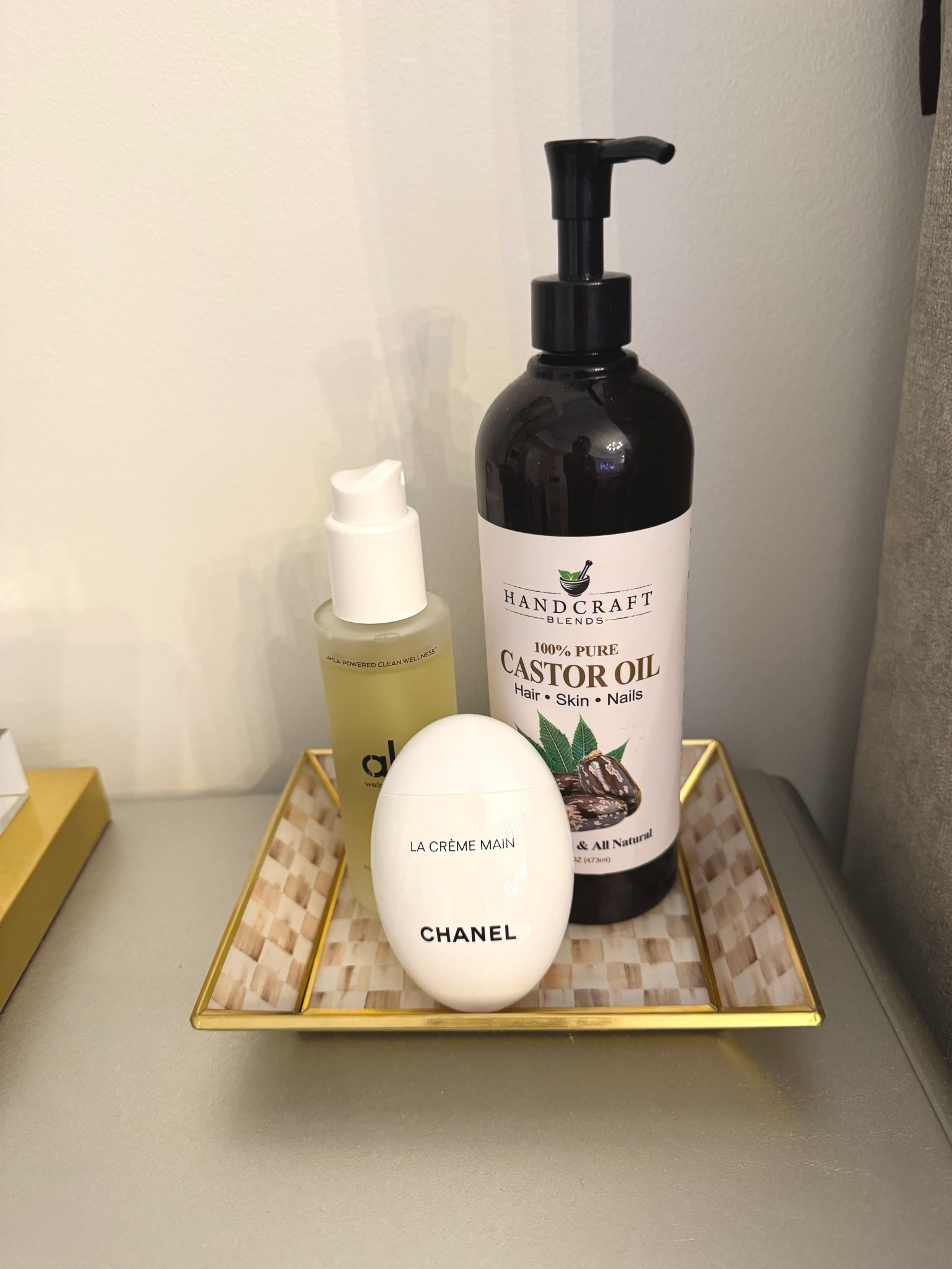 The perfect combo before bed.

Chanel hand cream, magnesium spray, and castor oil — simple, calming, and part of my nightly wind-down.

The Mackenzie Childs tray just fits the vibes ✨

#LTKBeauty #LTKHome #LTKselfcare