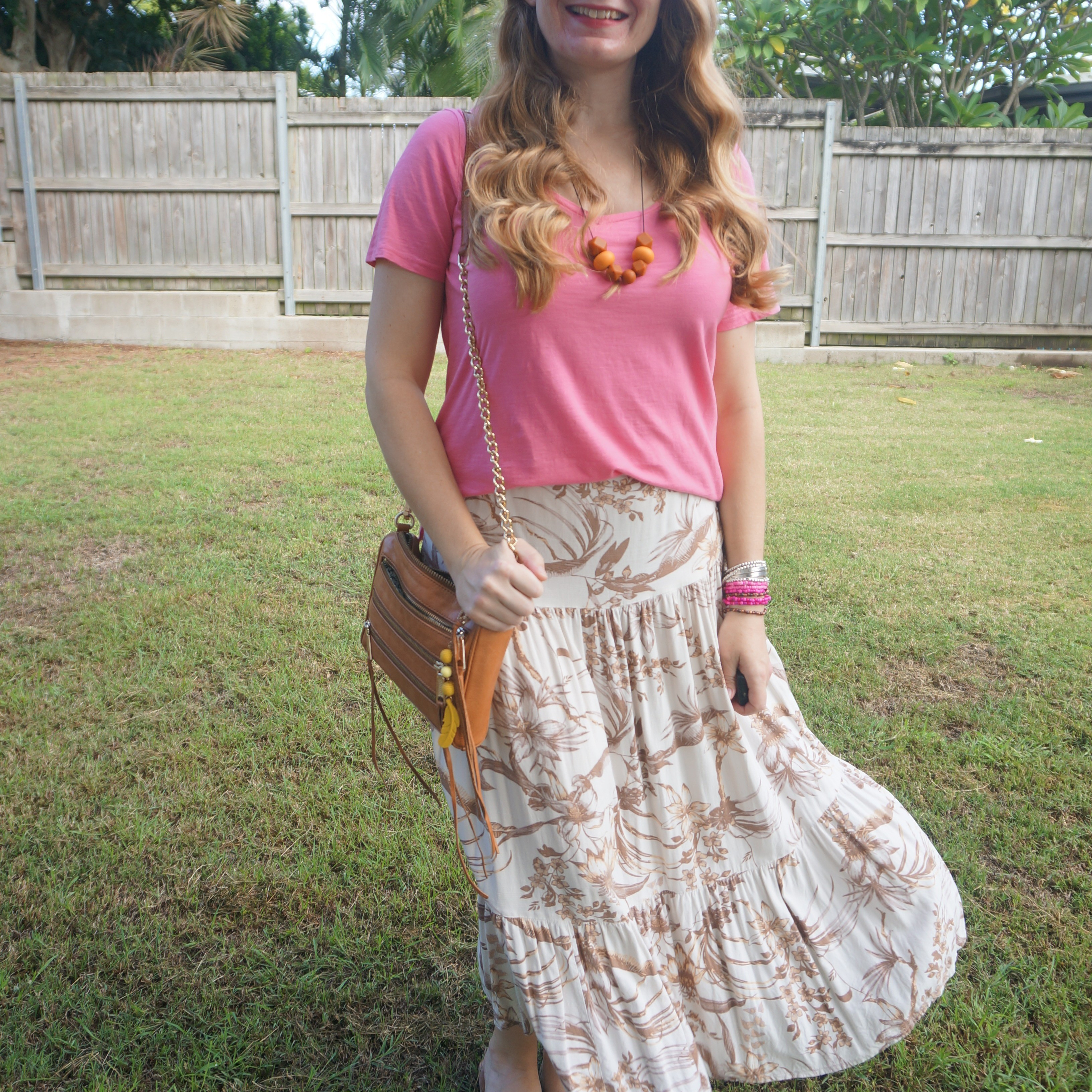 Pink tee with brown floral print maxi skirt and tan Rebecca Minkoff mini 5-zip bag 💕

#LTKaustralia #LTKbag