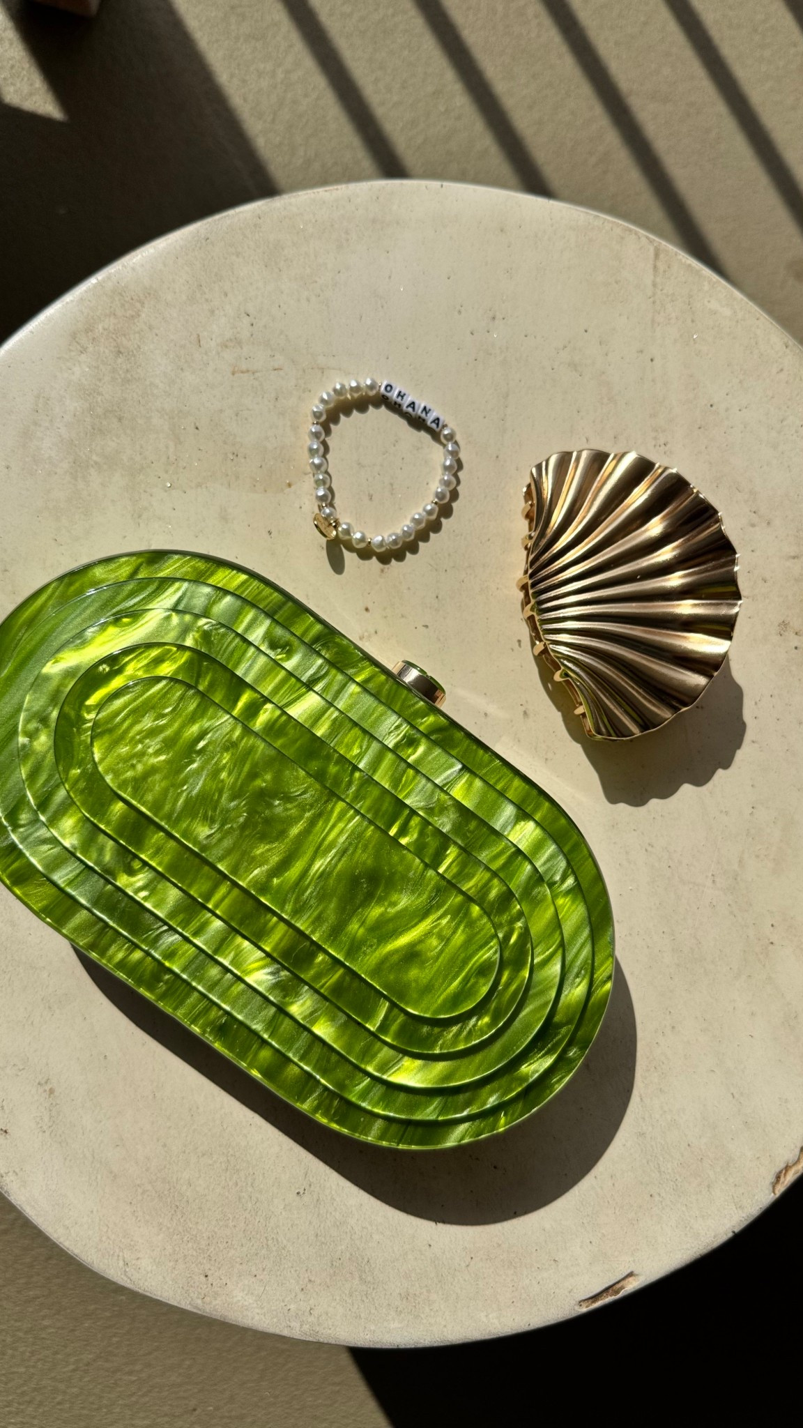 Beach essentials <3 I mean how cute is this gold shell claw clip! 

#LTKStyleTip #LTKBeauty #LTKFindsUnder50