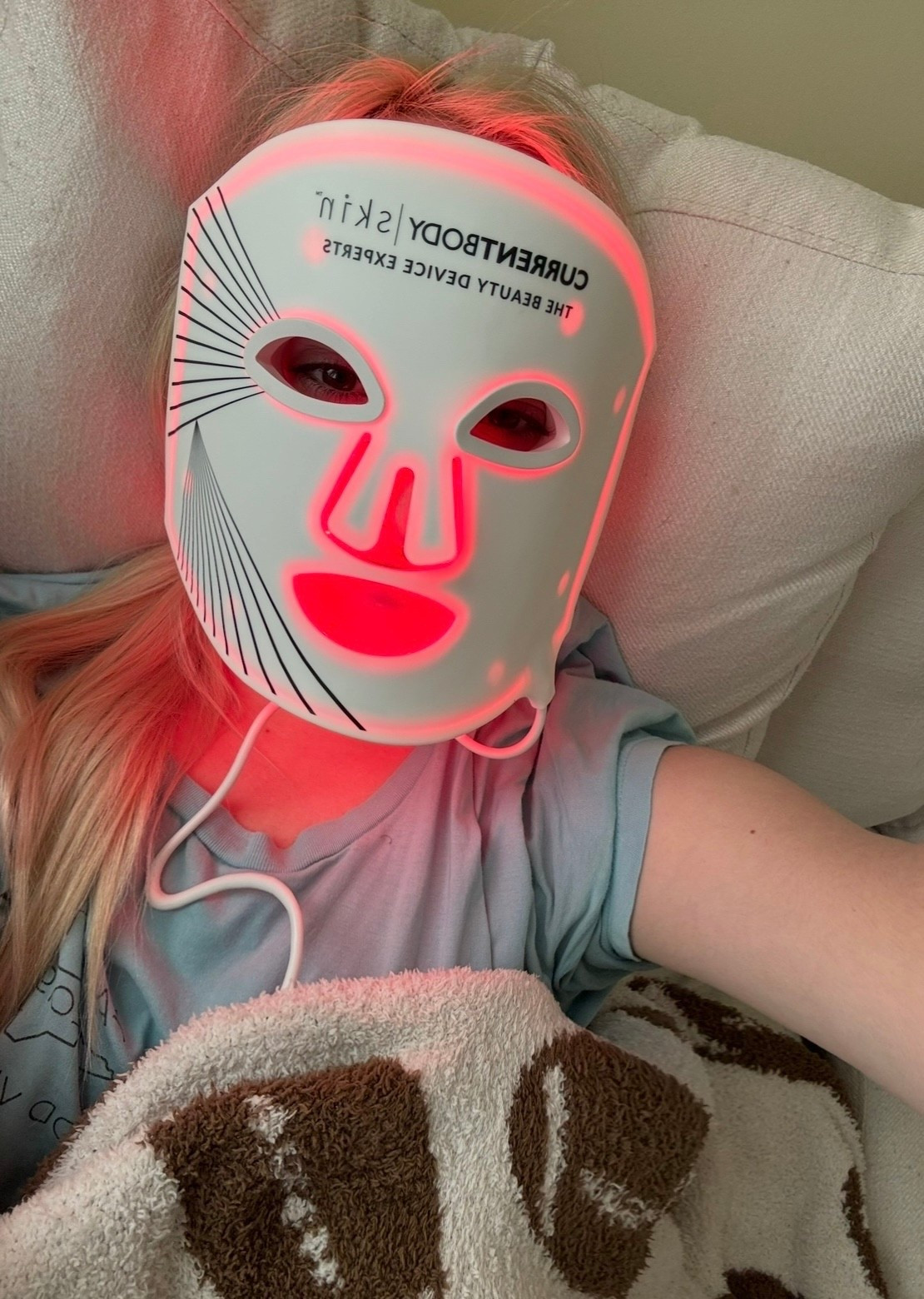 Red light therapy uses specific wavelengths of light that penetrate the skin and stimulate cellular energy production, which can encourage collagen and elastin synthesis. This process helps improve skin firmness and can reduce the appearance of fine lines and wrinkles over time. 

Red light masks can also be known to calm inflammation and support the skin’s natural healing process, which may help improve the appearance of blemishes and acne. Additionally, consistent use of red light therapy can enhance circulation and promote cellular repair, leading to improved skin tone, smoother texture, and an overall healthier complexion. 

According to board-certified dermatologist Whitney Bowe, red light therapy works by stimulating the mitochondria in skin cells—the part of the cell responsible for producing energy—which can help support collagen production, reduce inflammation associated with acne, and promote healthier skin function.

I’ve been using the red light mask by CurrentBody for several months now and have genuinely noticed a difference in my skin. It has naturally become part of my weekly routine, and I love how easy it is to incorporate while relaxing at home. At this point, I find myself wanting to continue expanding my collection. My next potential investments will likely be a red light shower head and a grounding mat.
Below are the exact links to the one I use. ☺️🧘🏼‍♀️

#LTKdayinmylife #LTKootd #LTKmorningroutine